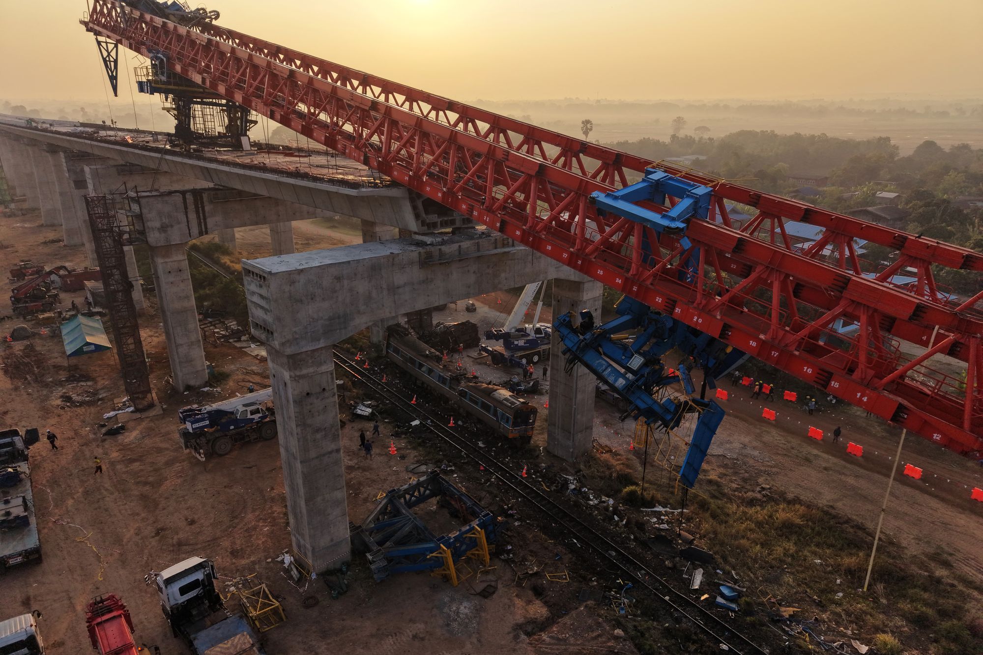 Thailand’s acting PM calls for blacklisting of construction firm after crane collapse on train kills 32