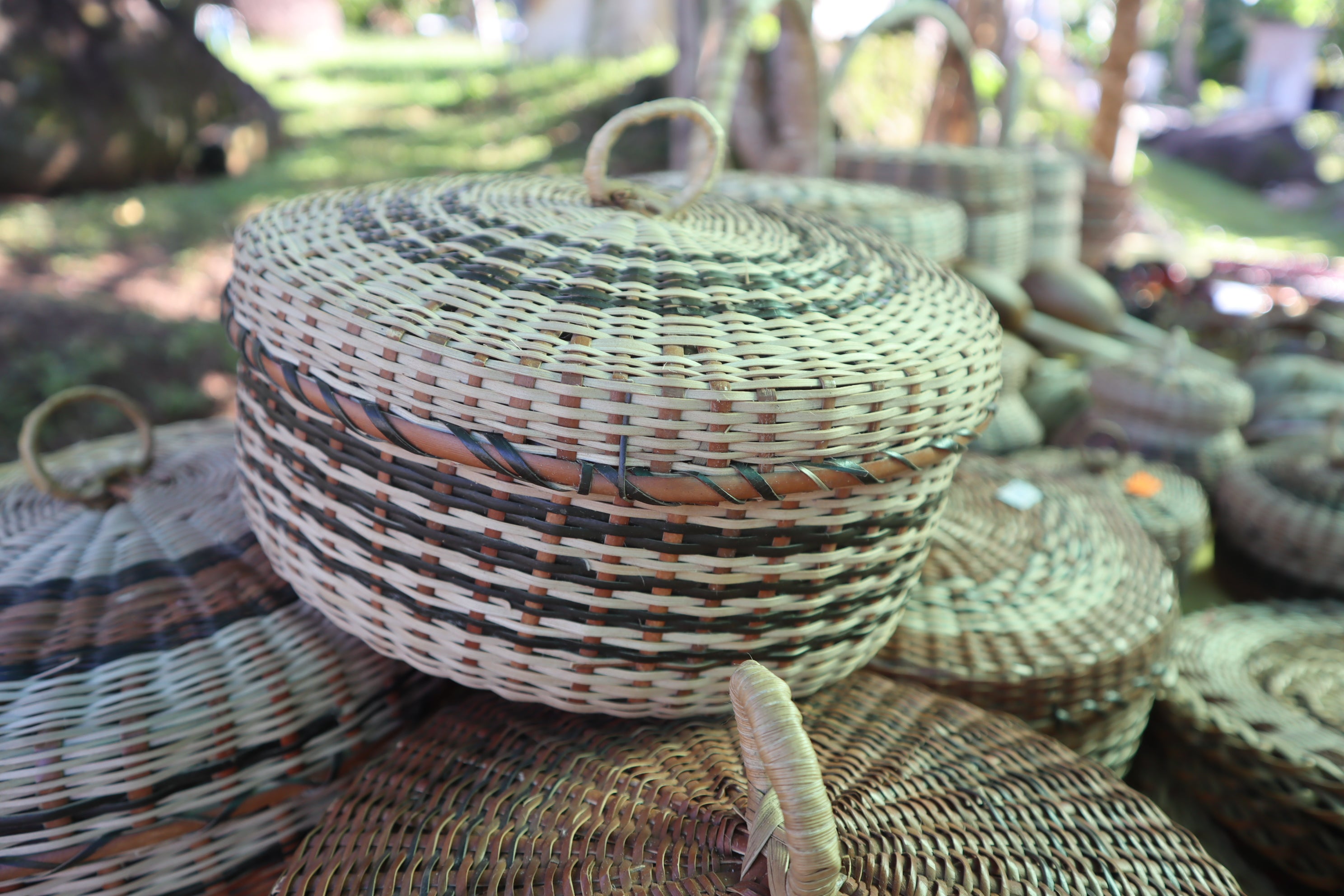 The Kalinago indigenous people make hand-woven baskets, coconut shell bracelets and seed necklaces