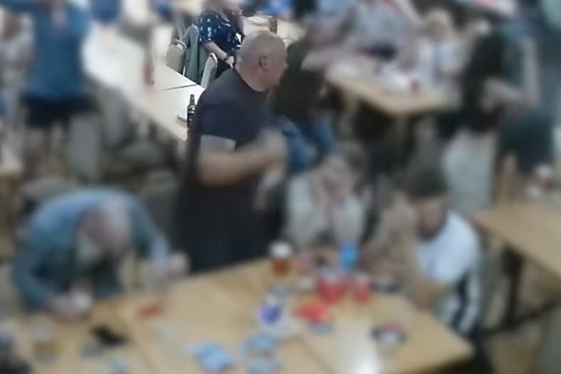 In another clip he appeared carrying trays of beer around in a pub