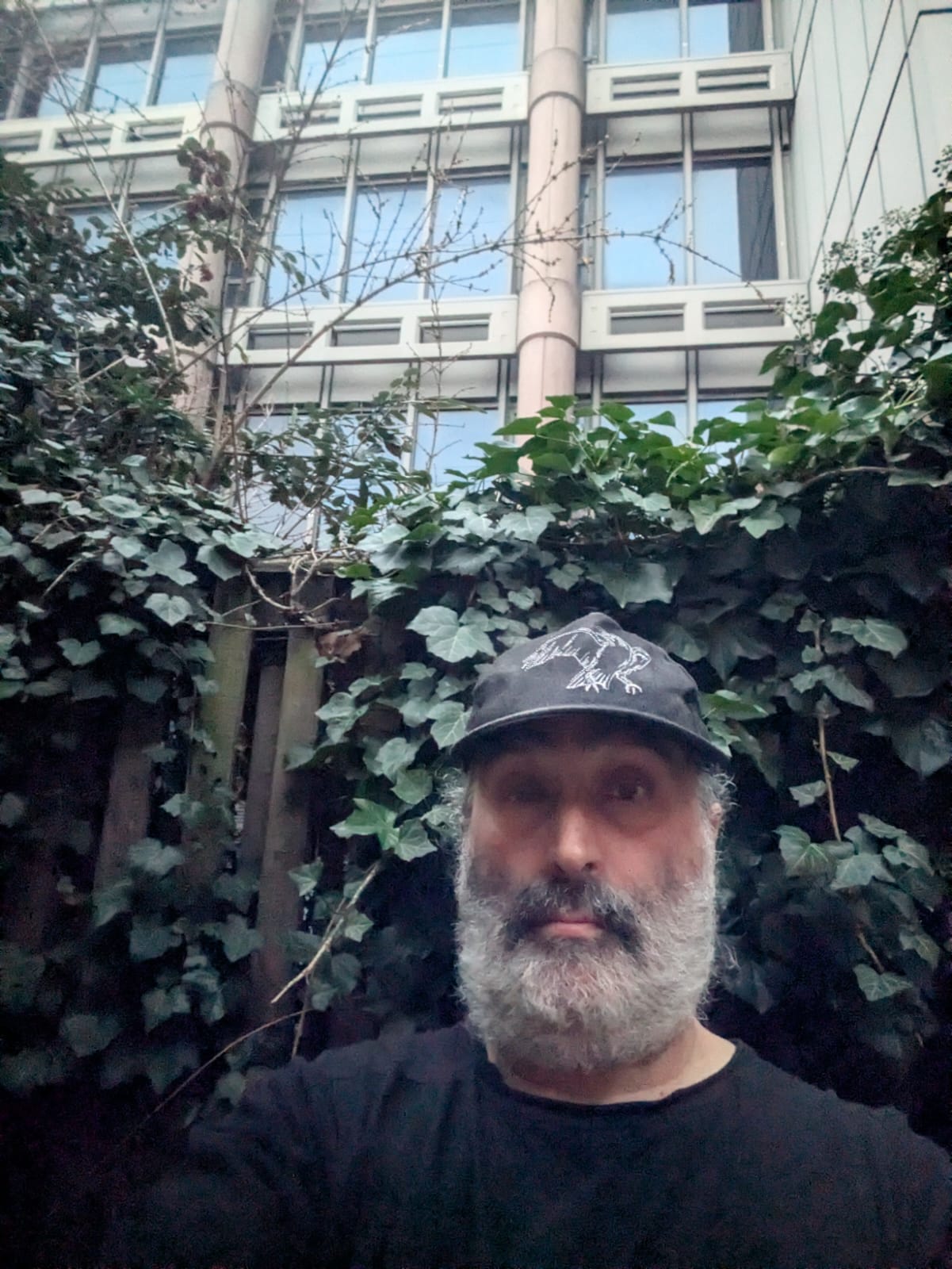 Mark Nygate, treasurer of Royal Mint Residents Association, in front of the fence he says would be the border between his home and a new Chinese embassy