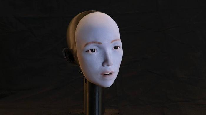 The robot learned the ability to use its 26 facial motors by watching hours of YouTube videos and practicing to imitate human lip motions by observing its own reflection in the mirror