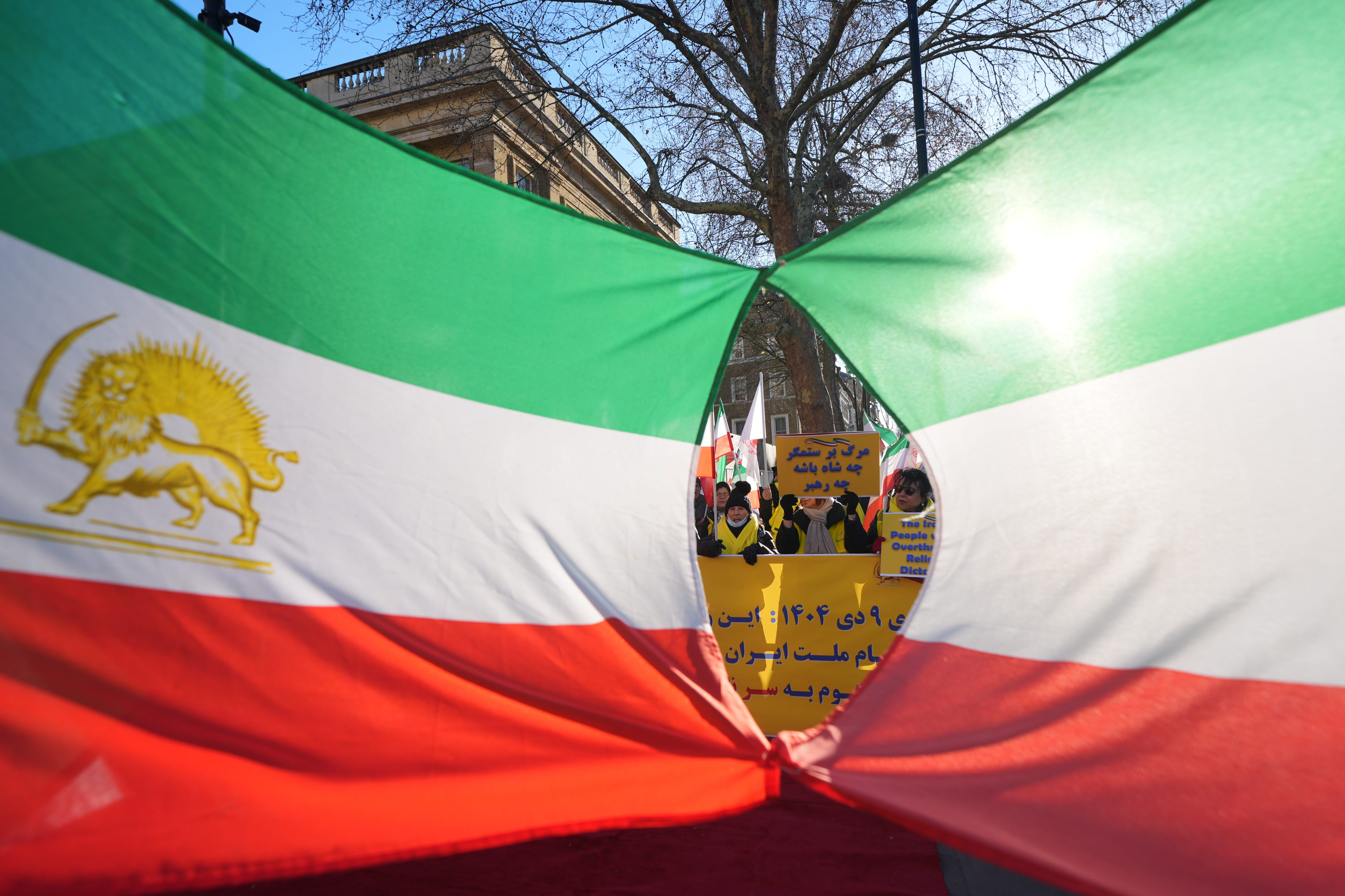 Activists from the Association of Anglo-Iranian Women in the UK during a rally outside 10 Downing Street, Whitehall, central London (Yui Mok/PA)