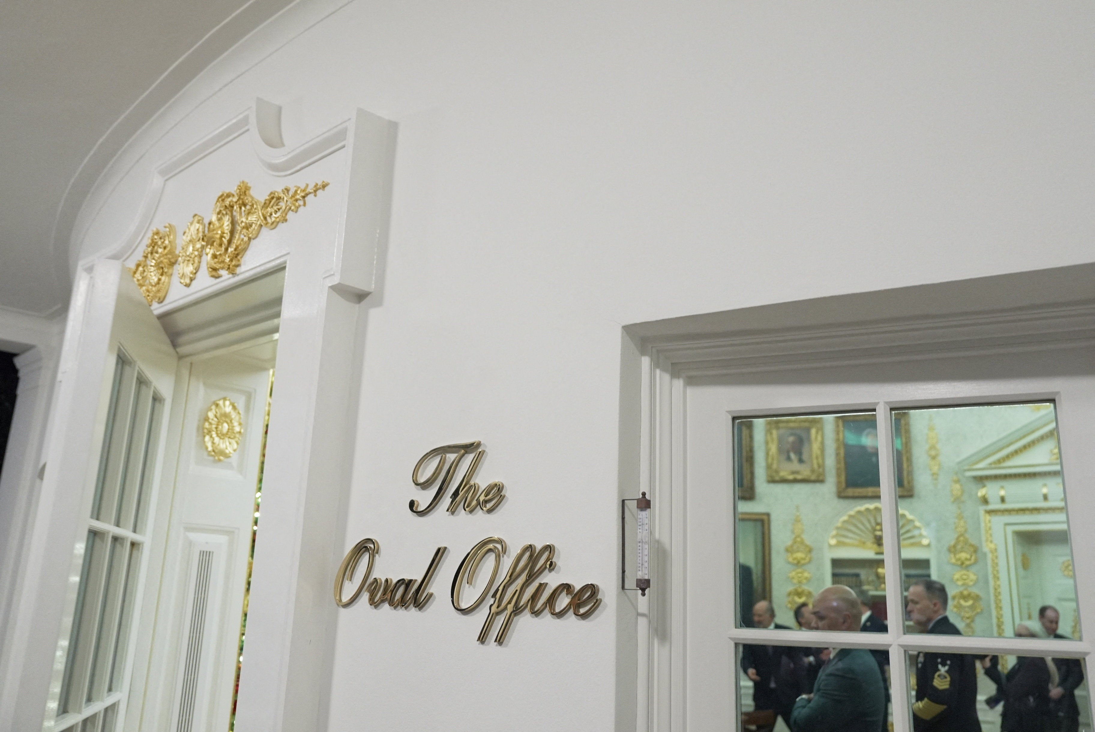 A sign outside the Oval Office indicates that it is in fact the Oval Office