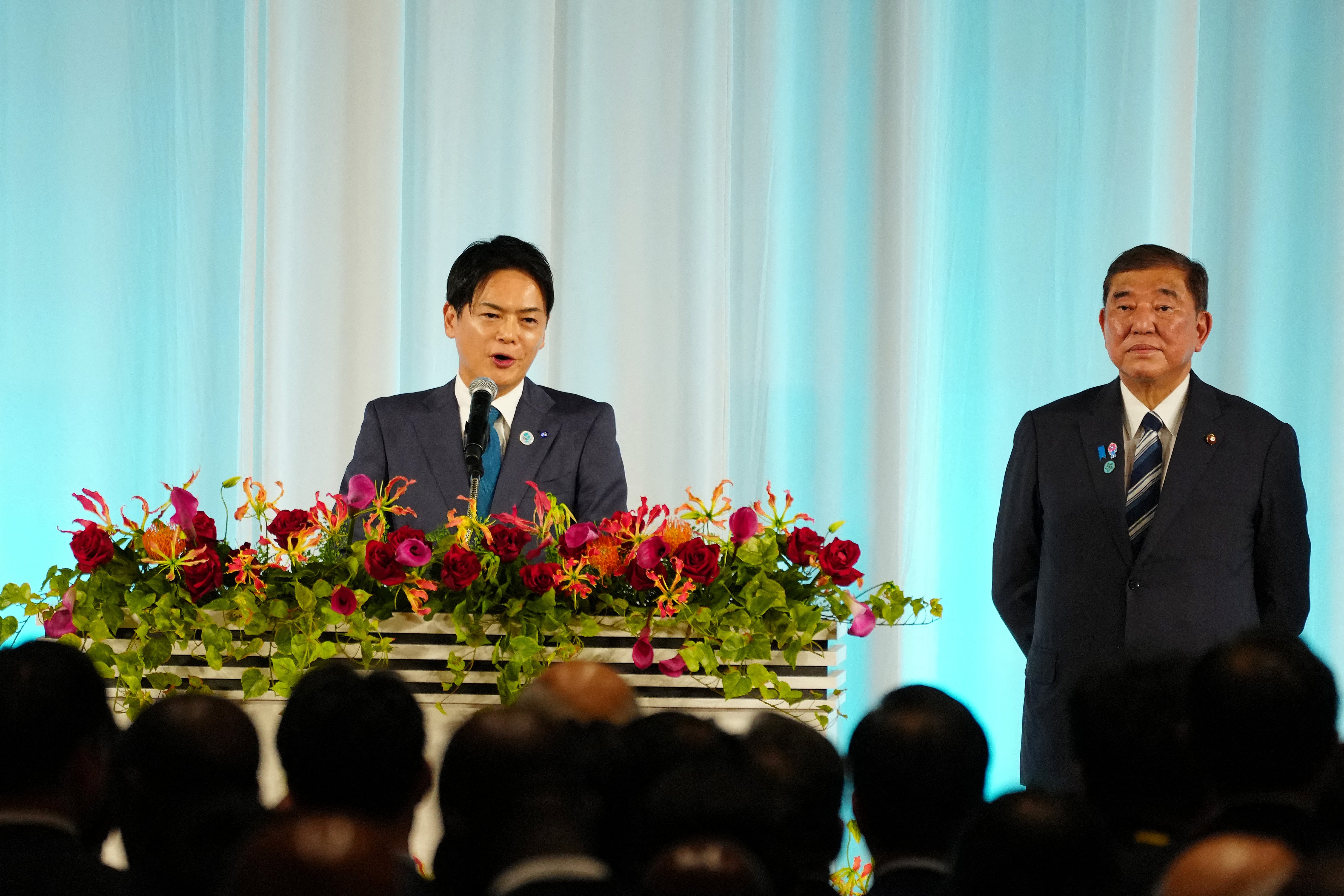 File: Mayor of Yokohama Takeharu Yamanaka (L) delivers a speech as Shigeru Ishiba looks on during the welcome reception for the 9th Tokyo International Conference on African Development (TICAD 9) in Yokohama, Kanagawa prefecture, south of Tokyo, on 20 August 2025