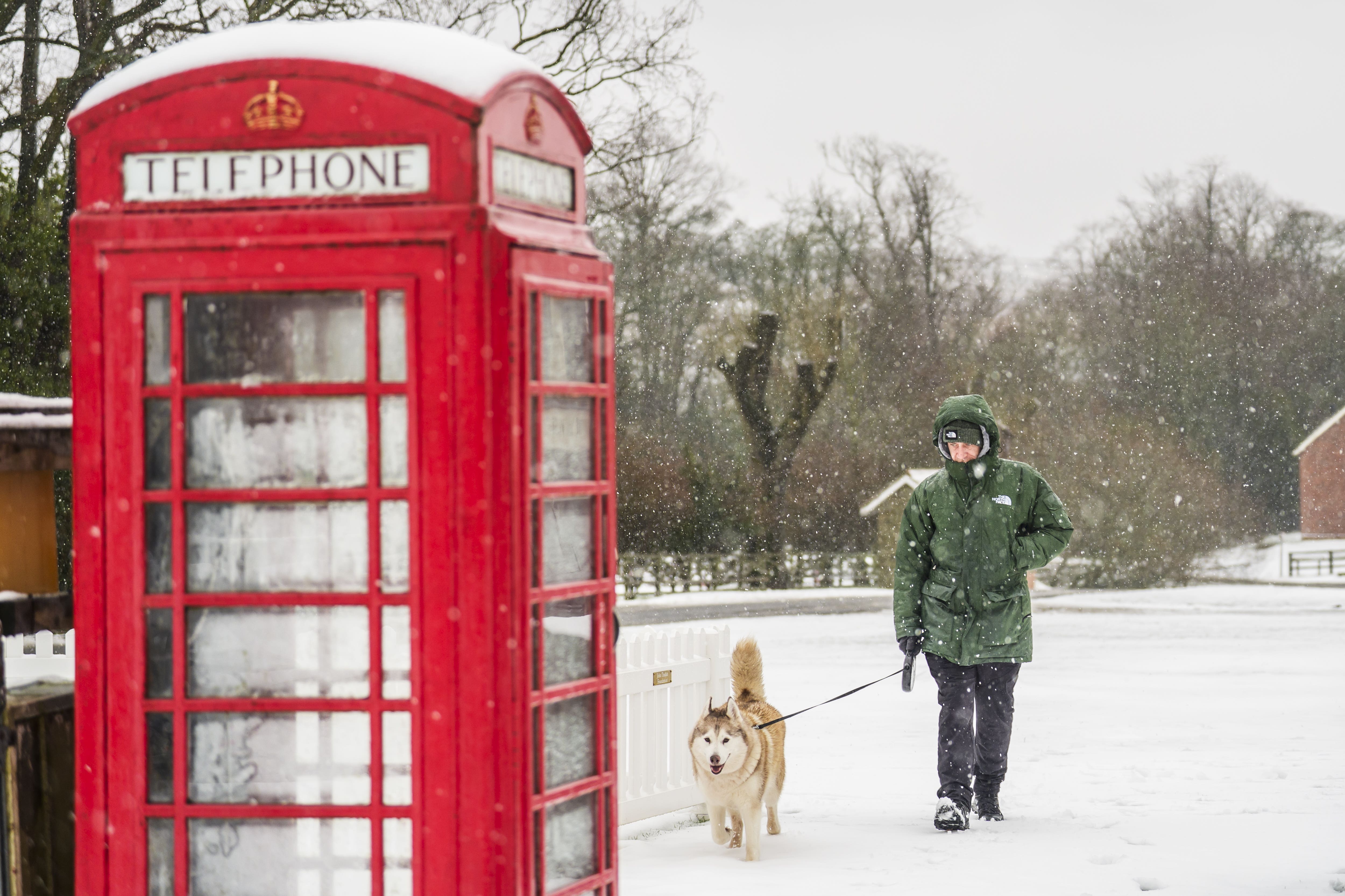 A man walks his dog in Goathland in the North York Moors National Park, earlier in the month (Danny Lawson/PA)