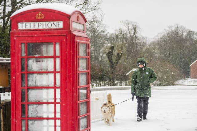 A man walks his dog in Goathland in the North York Moors National Park, earlier in the month (Danny Lawson/PA)
