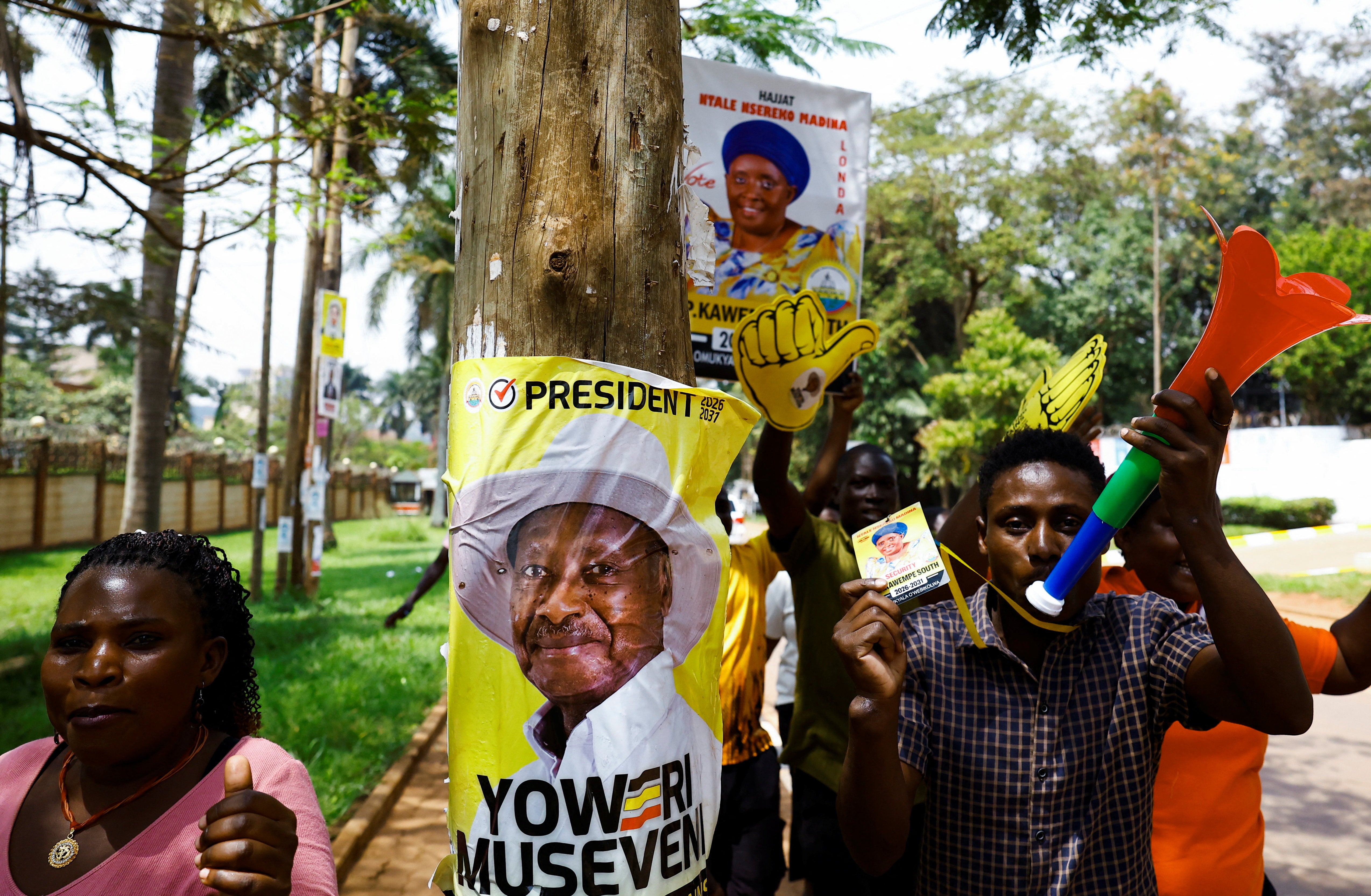 Supporters of Uganda's President Yoweri Museveni celebrate the announcement of the final presidential results