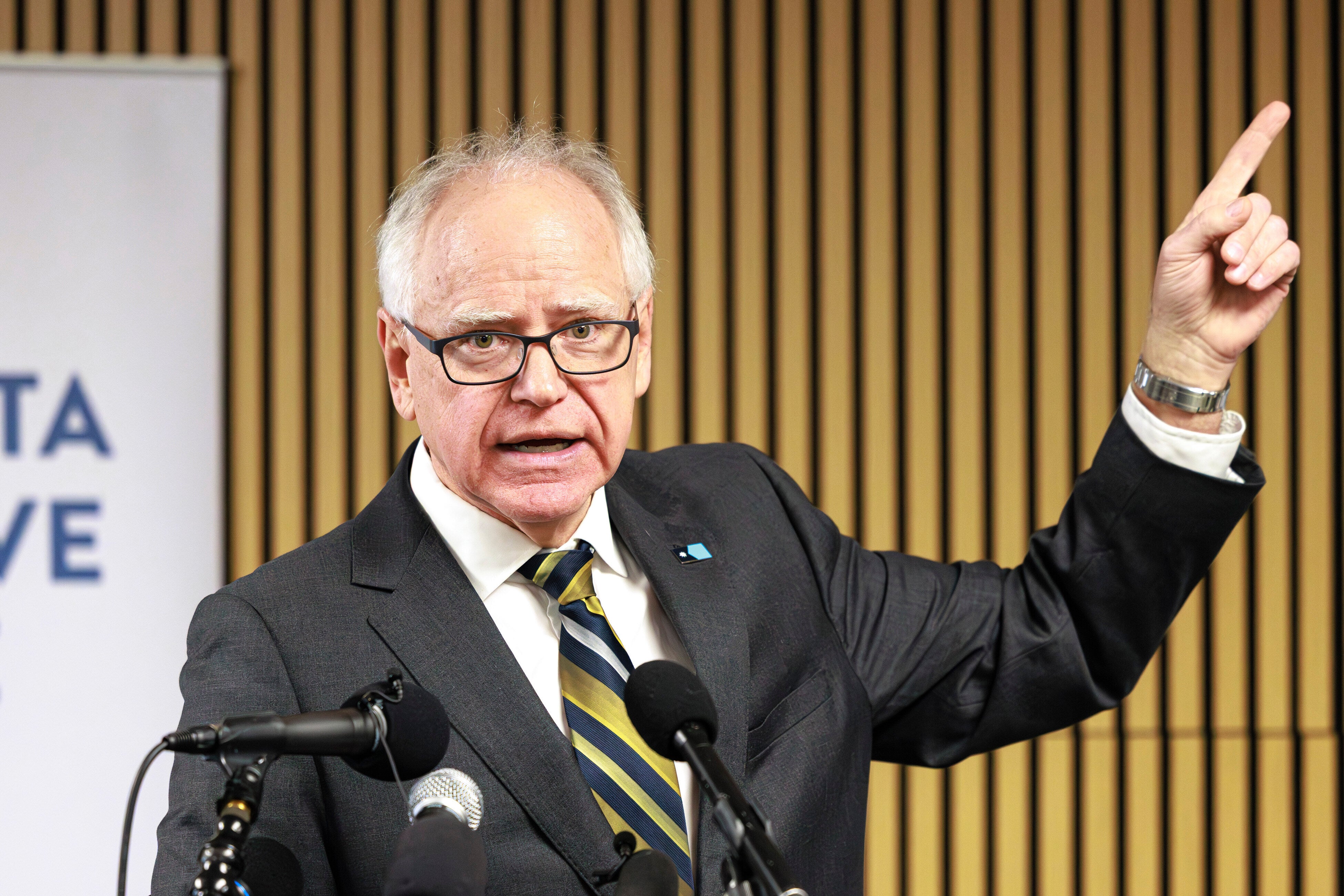 <p>The DOJ alleges that Minnesota Governor Tim Walz (pictured) and Minneapolis Mayor Jacob Frey impeded federal agents during a law enforcement surge in the state</p>