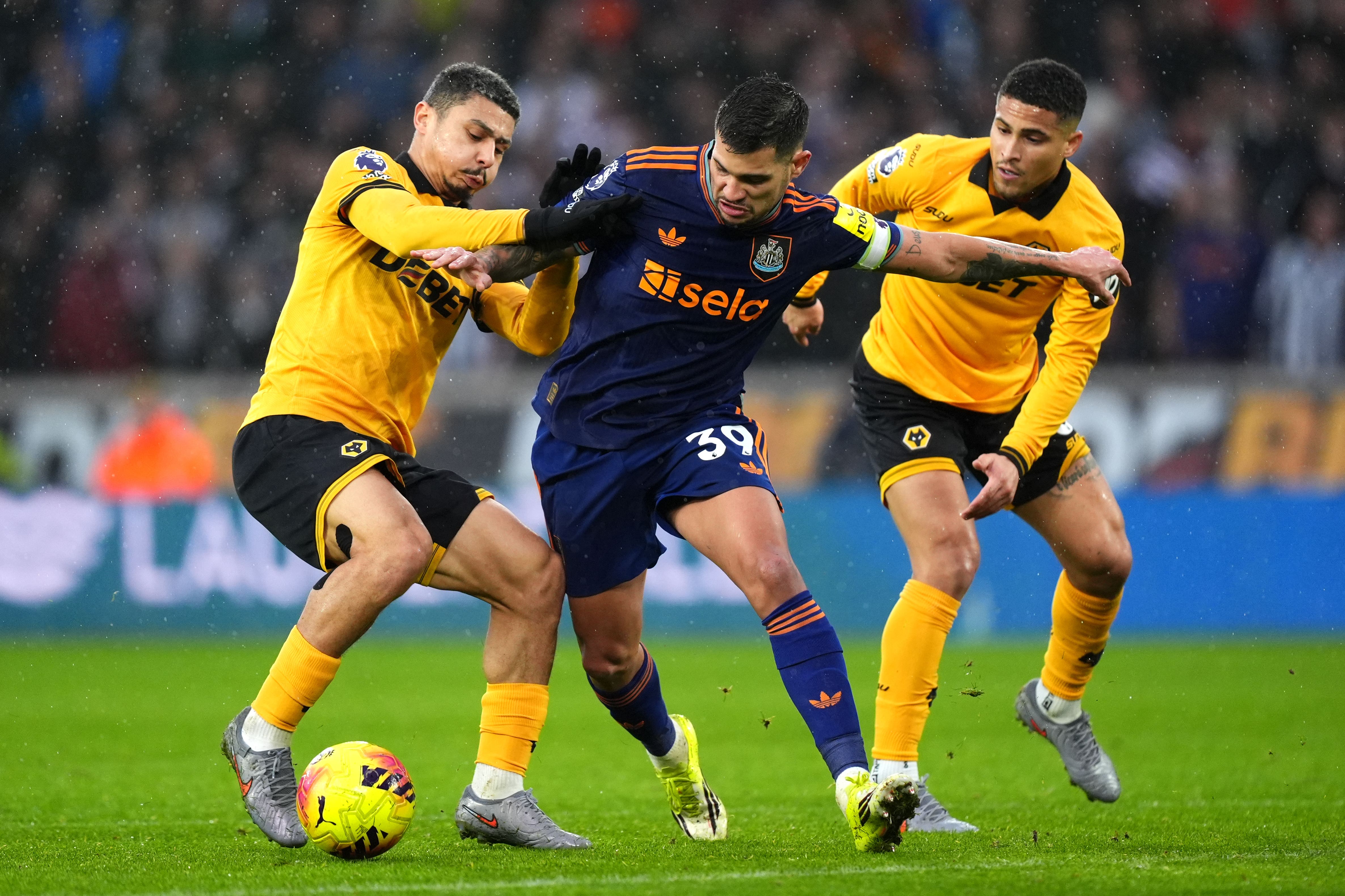 Wolves’ Andre and Newcastle’s Bruno Guimaraes battle for possession in a drab 0-0 draw