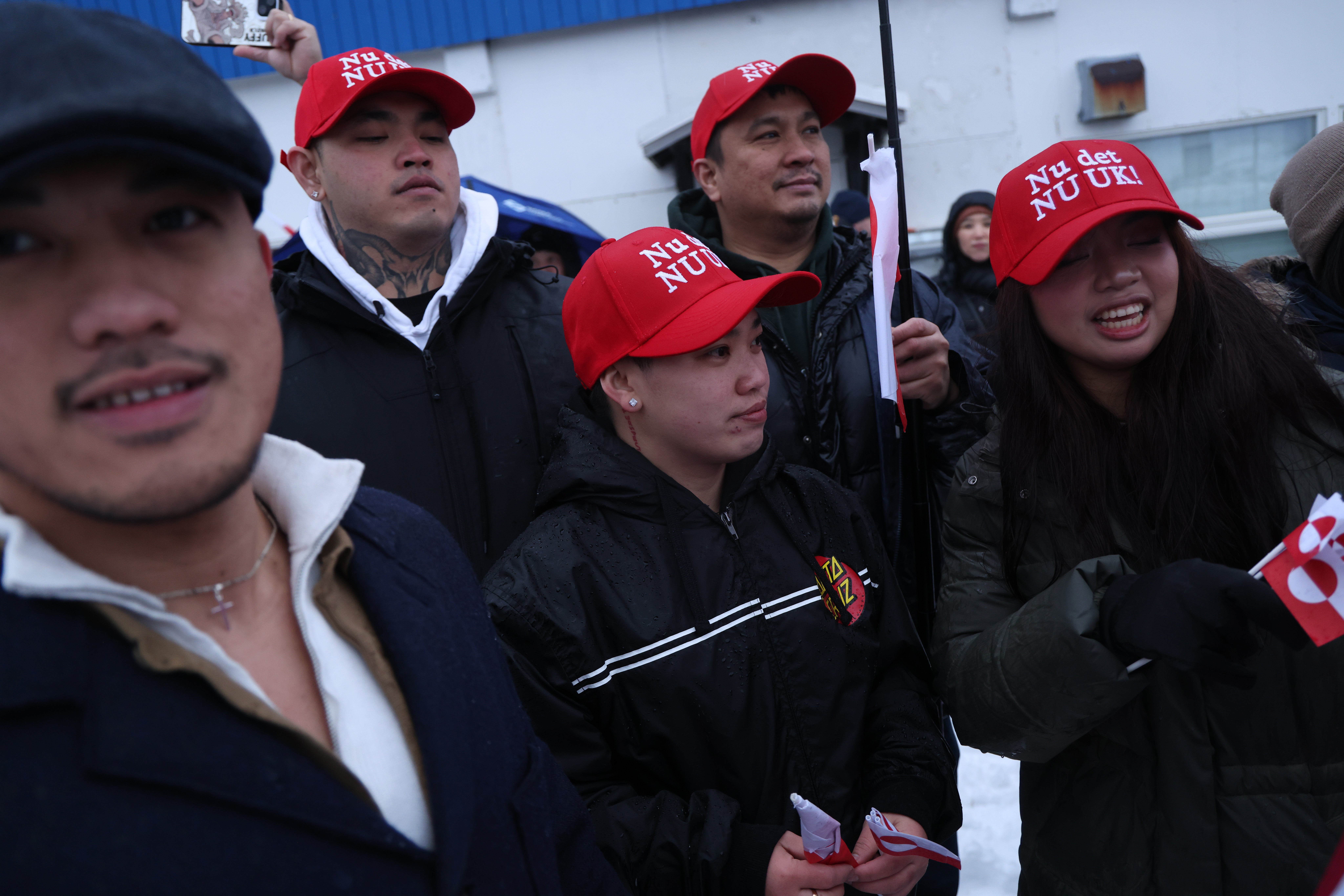 Greenlanders wore parody MAGA-style hats that read ‘Now is Nuuk’ and ‘Enough is Enough’ as they demonstrate against Trump’s attempts to control the island