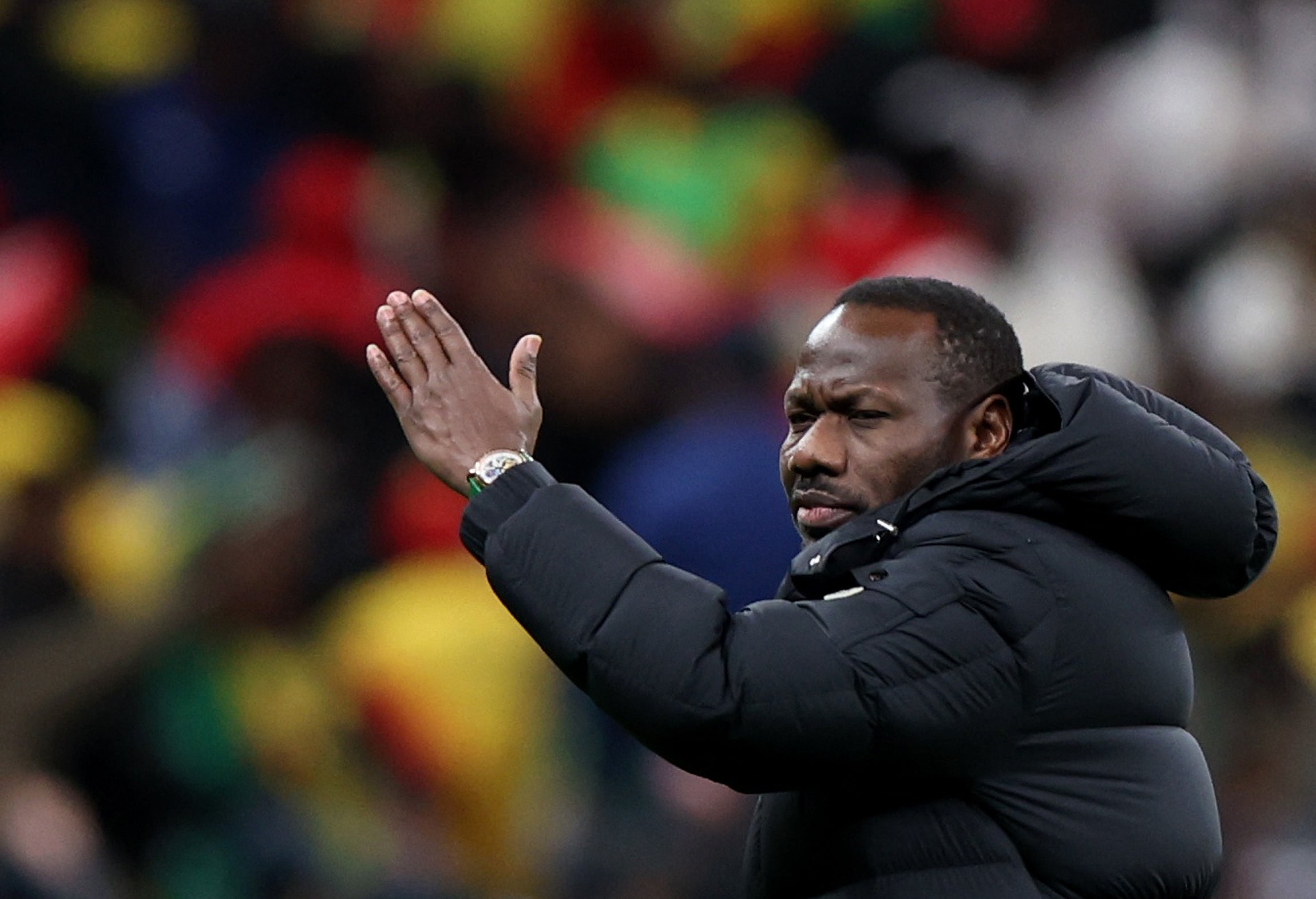 Senegal manager Pape Thiaw ordering his players off the pitch