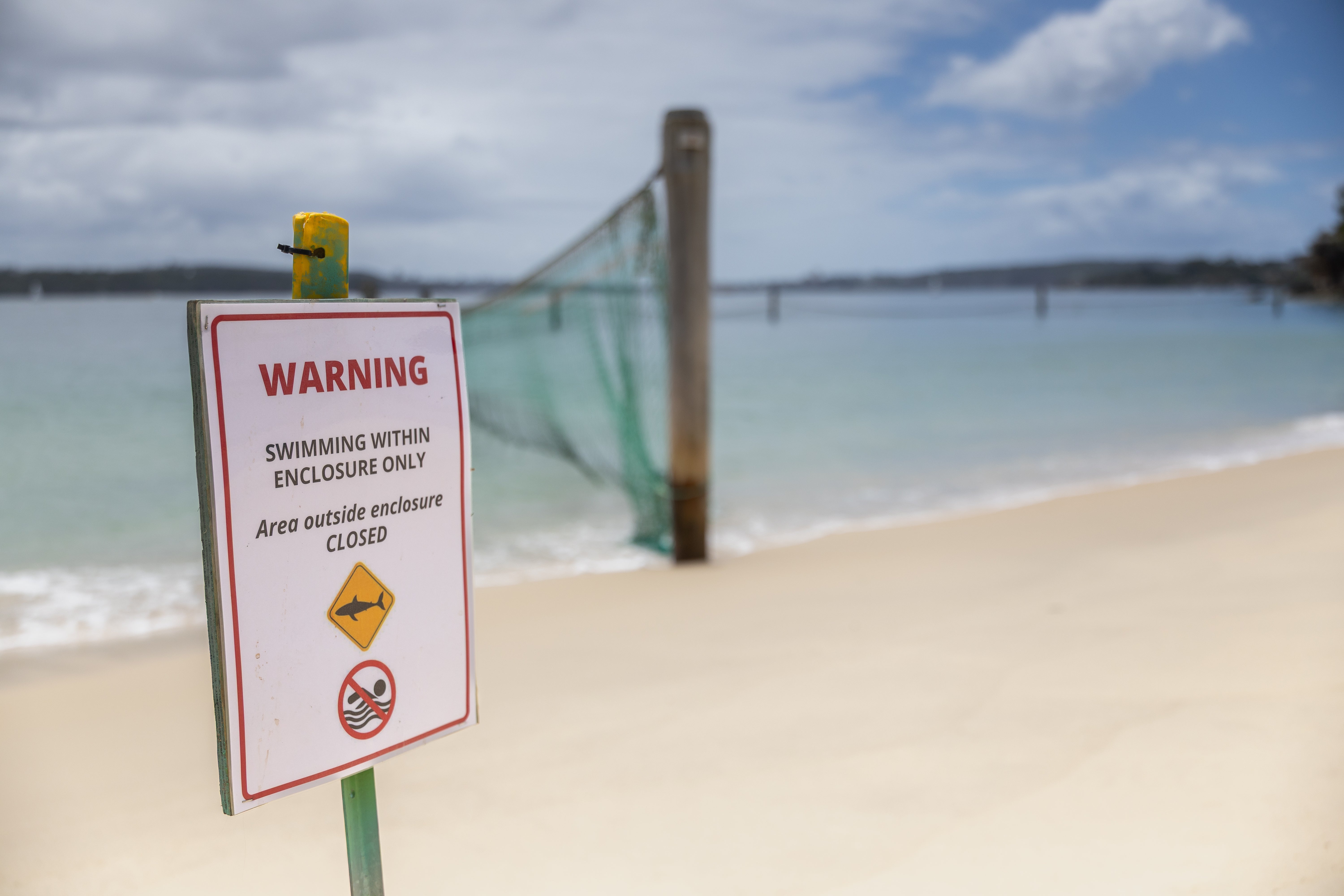 A net runs into Sydney Harbour at a closed beach at Vaucluse in Sydney, Monday, Jan. 19, 2026, a day after a boy was attacked by a shark. (Sitthixay Ditthavong/AAP Image via AP)