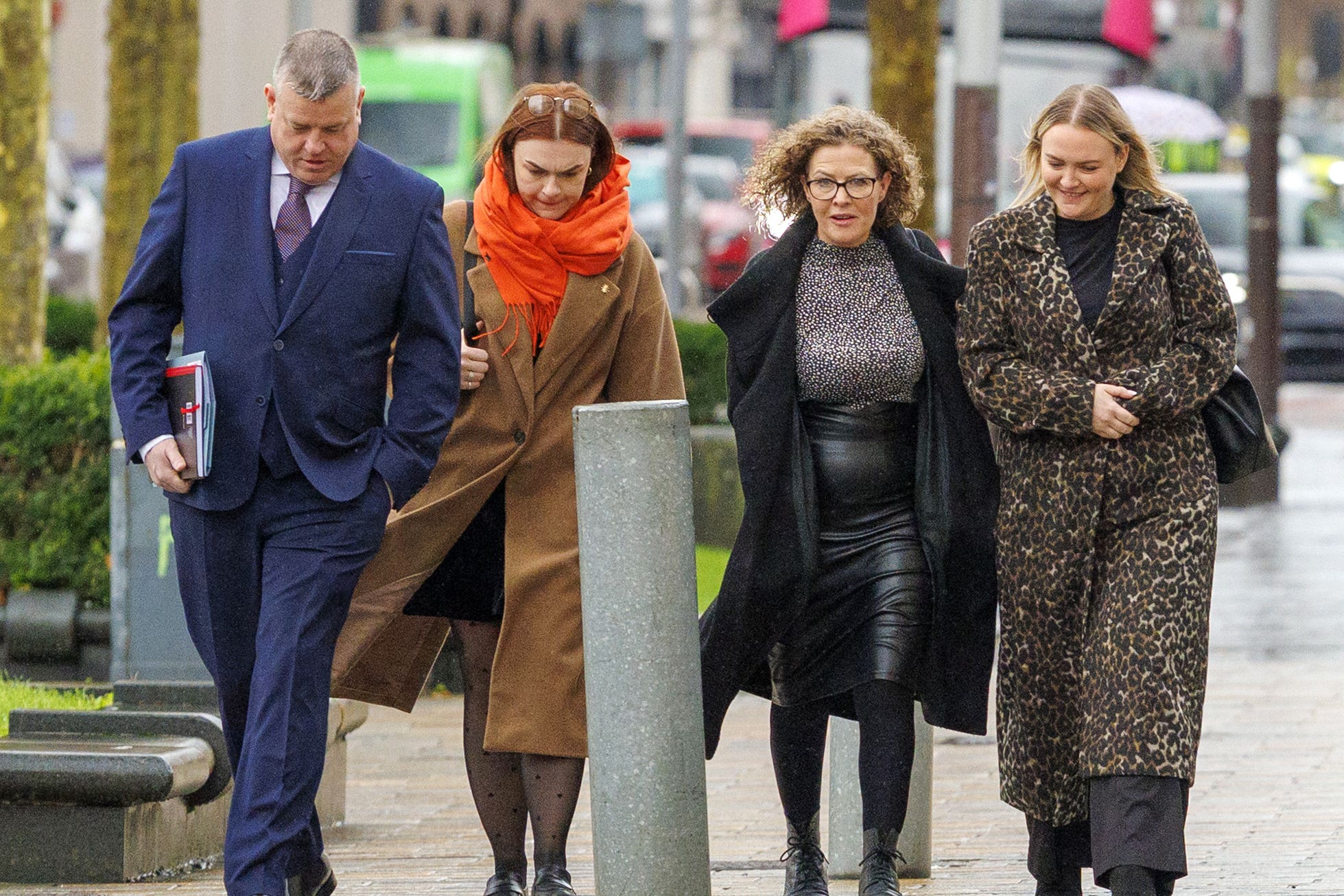 Solicitor Niall Murphy (left) and Fiona Donohoe (third left), the mother of Noah Donohoe, outside Belfast Coroner’s Court, for the inquest into the death of 14-year-old Noah, who was found dead in a storm drain in north Belfast in June 2020, six days after he went missing while cycling to meet friends. Picture date: Monday January 19, 2026.