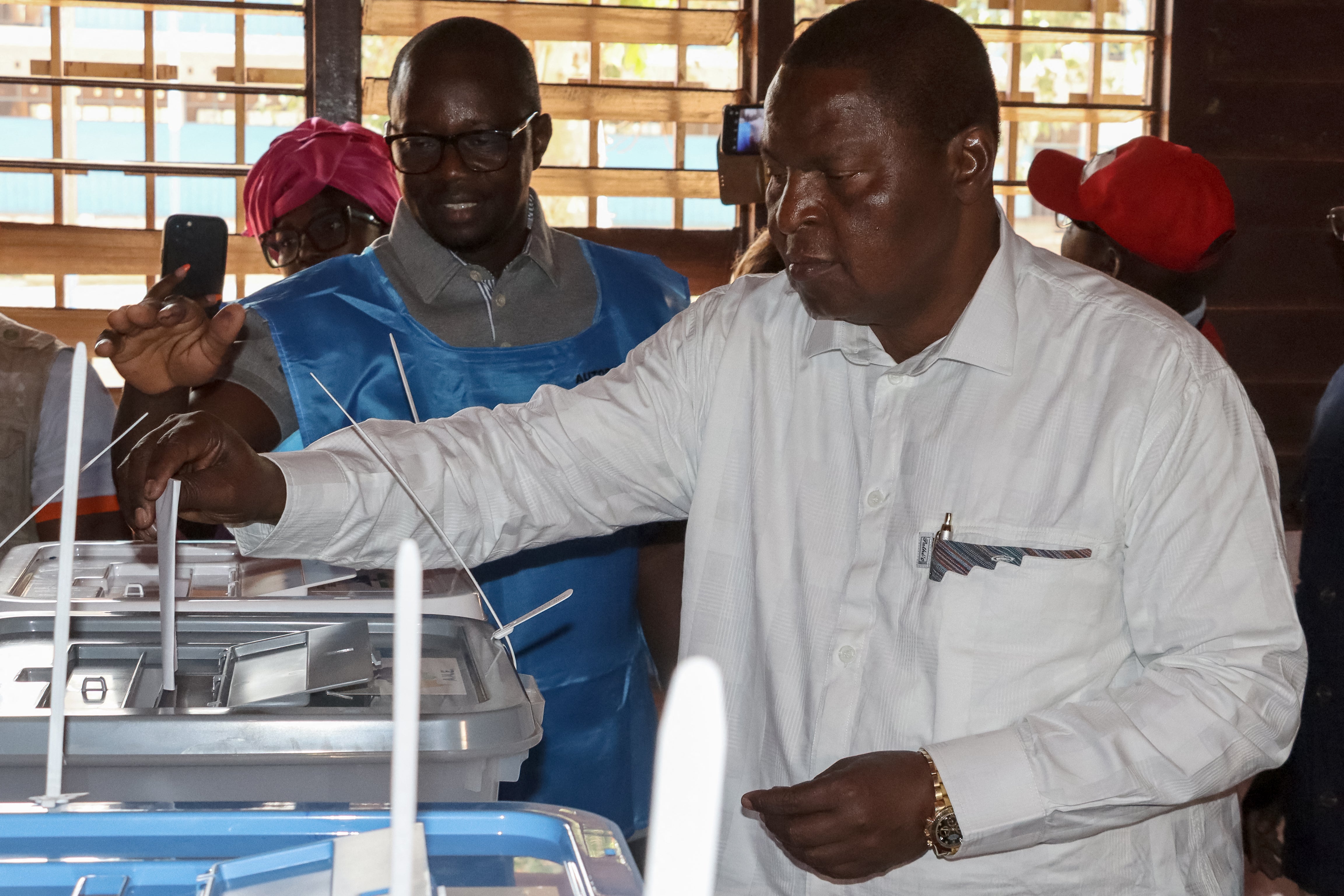 Central African Republic's President and presidential candidate for the United Hearts Movement (MCU) Faustin Archange Touadera casts his ballot at a polling station in Bangui on 28 December 2025 during Central African Republic's presidential election