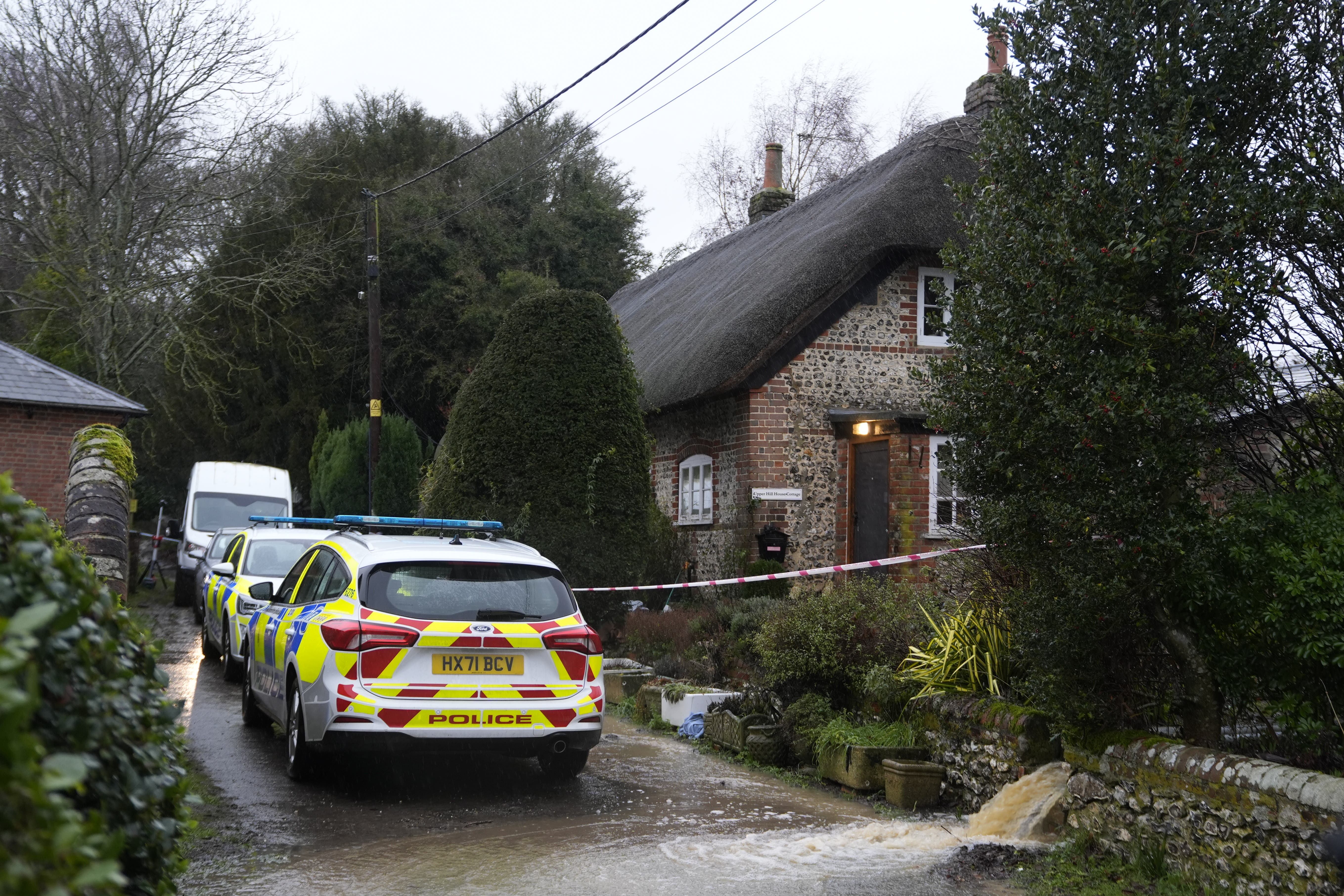 Police at the property in Cheriton where Gilly Livie was found (Andrew Matthews/PA)