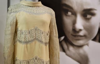 Aubrey Hepburn's famous Valentino cream lace and silk mini dress from 1968, displayed at the Kerry Taylor Auctions in 2009 in London