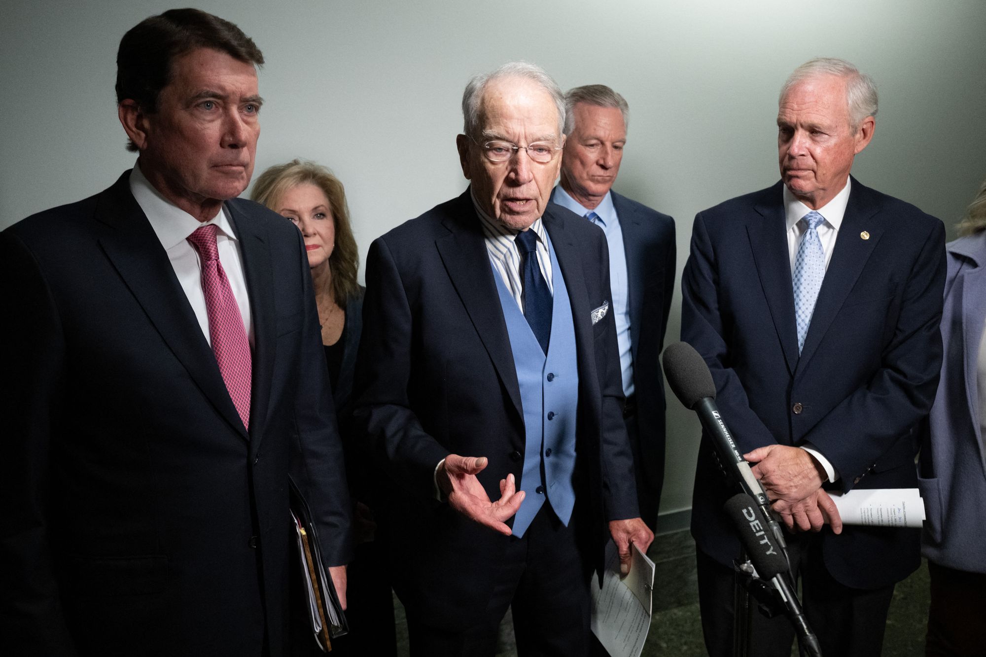 Grassley (center) and a group of Republicans announced in October that a government whistleblower had released information about Smith's 'Arctic Frost' investigation targeting Republicans