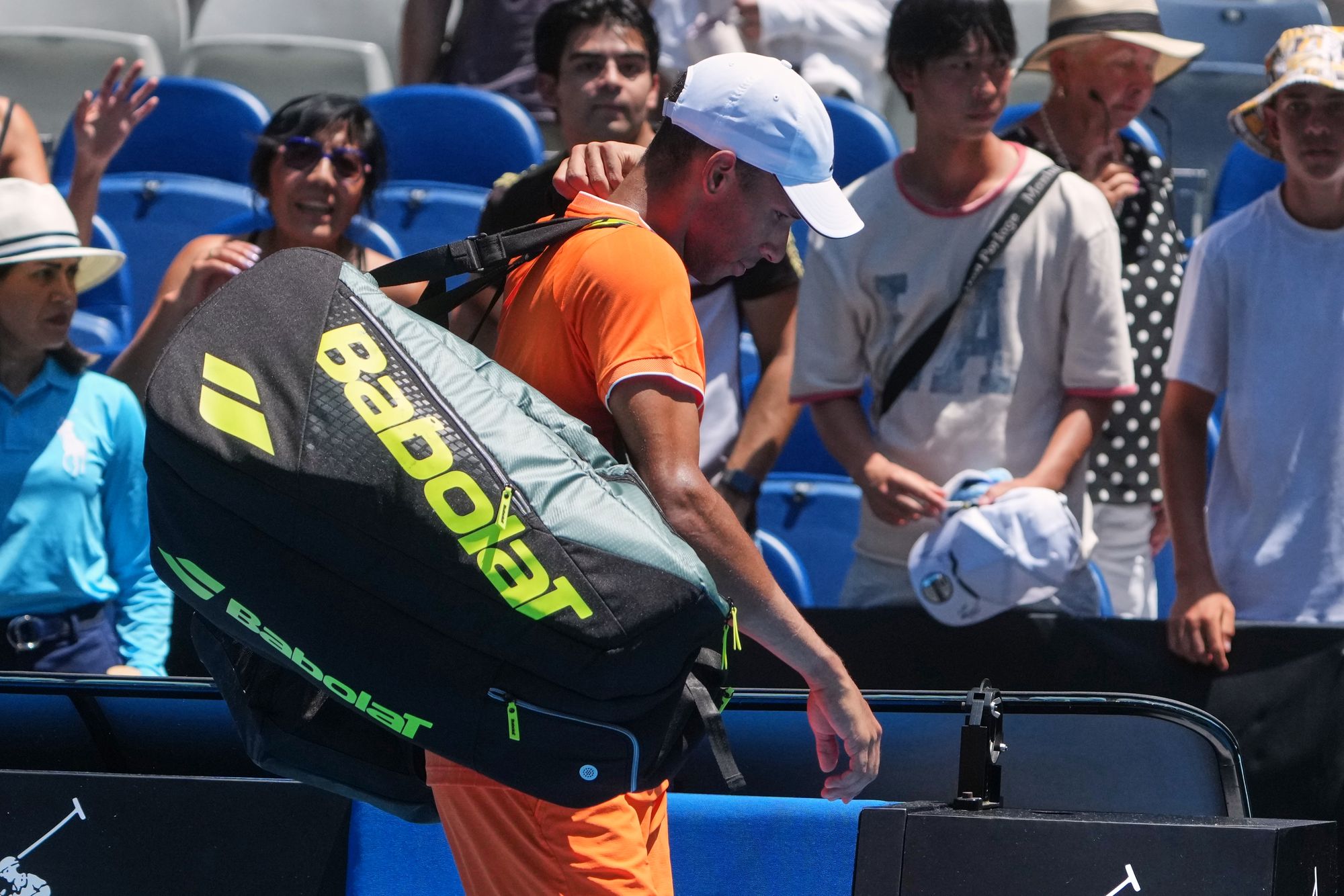 <p>Felix Auger-Aliassime of Canada walks from the court after he retired in his first round match against Nuno Borges</p>