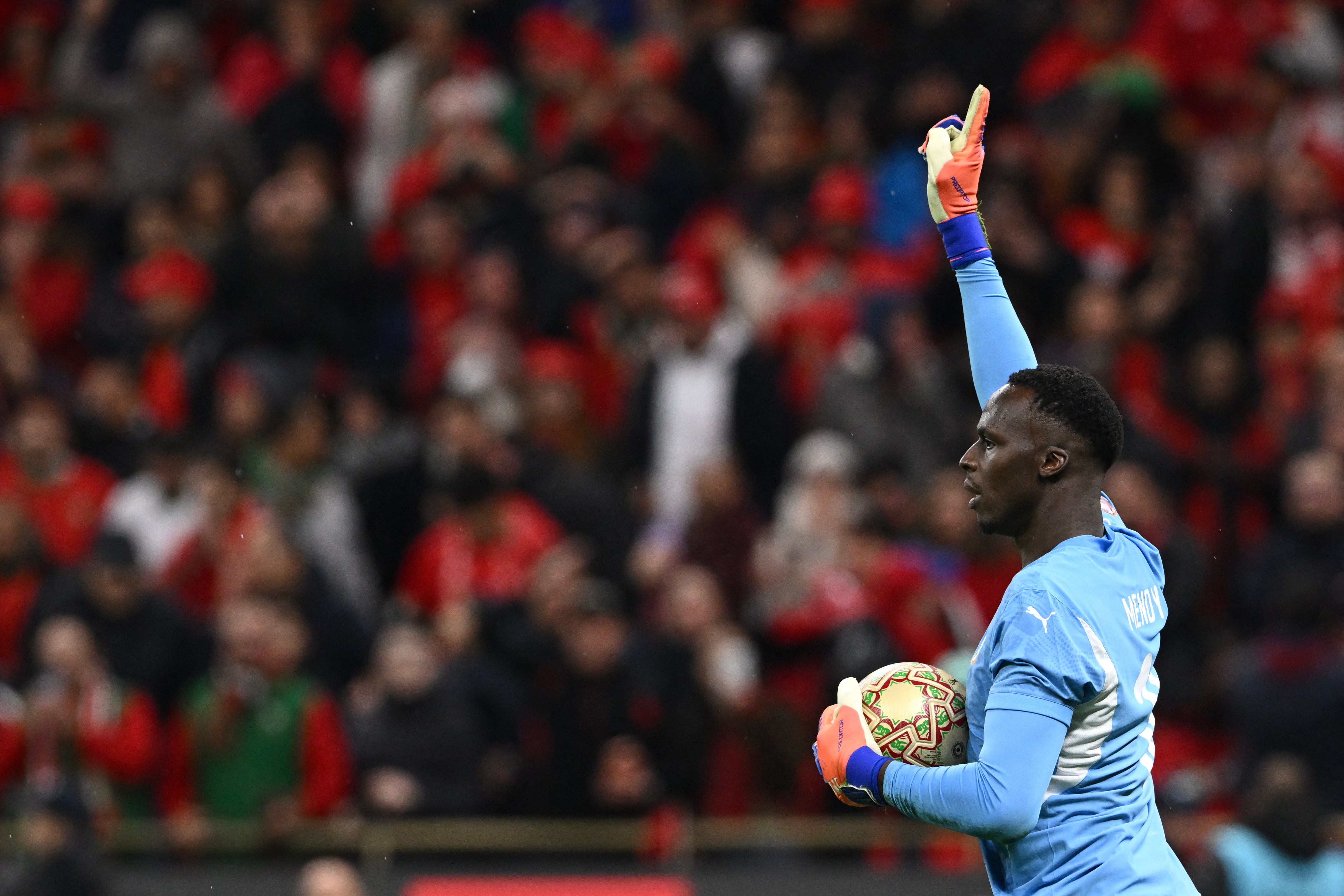 <p>Senegal's goalkeeper Edouard Mendy reacts after stopping a penalty</p>