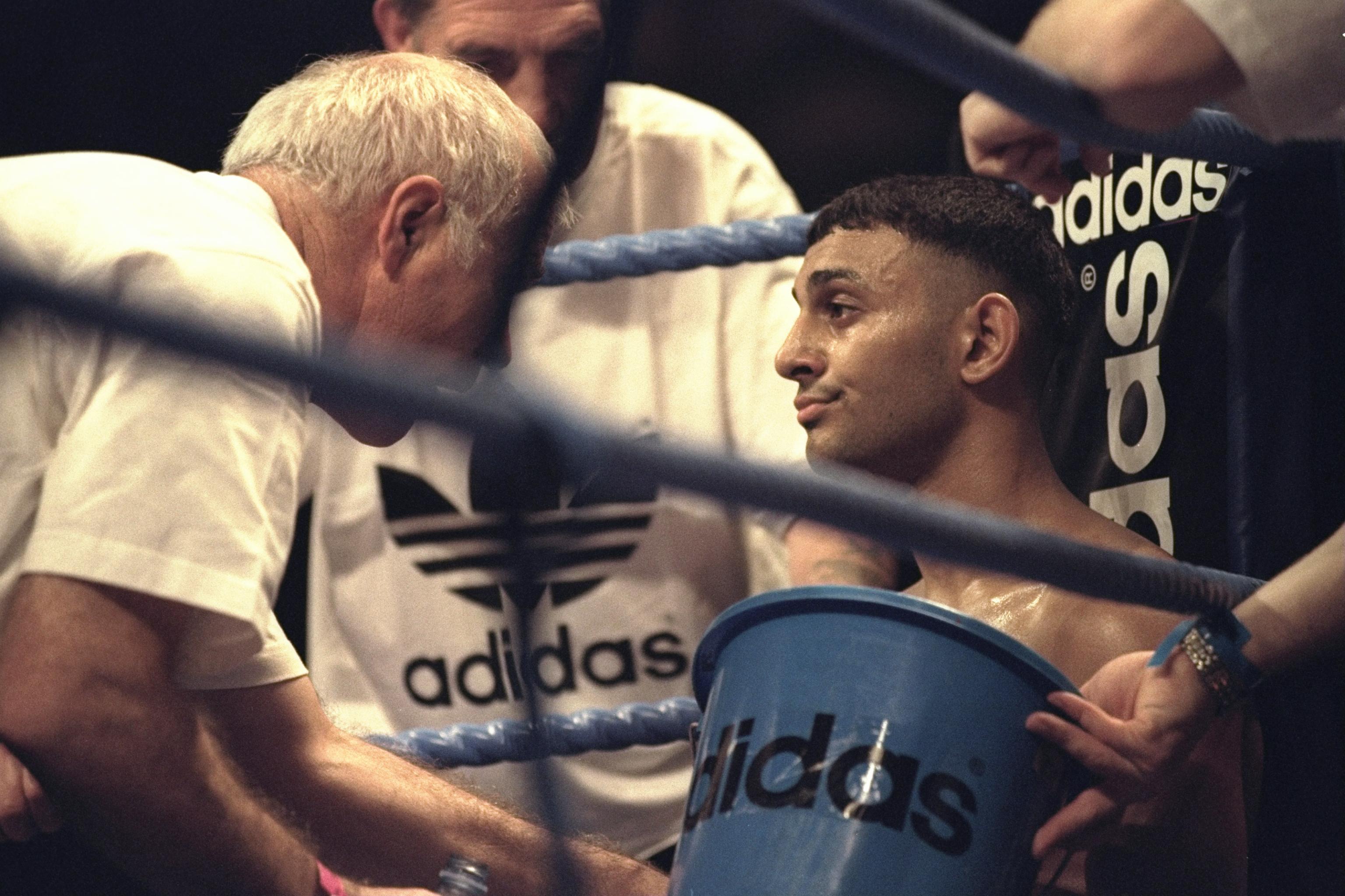Prince Naseem (right) receiving instructions from coach Brendan Ingle in 1996