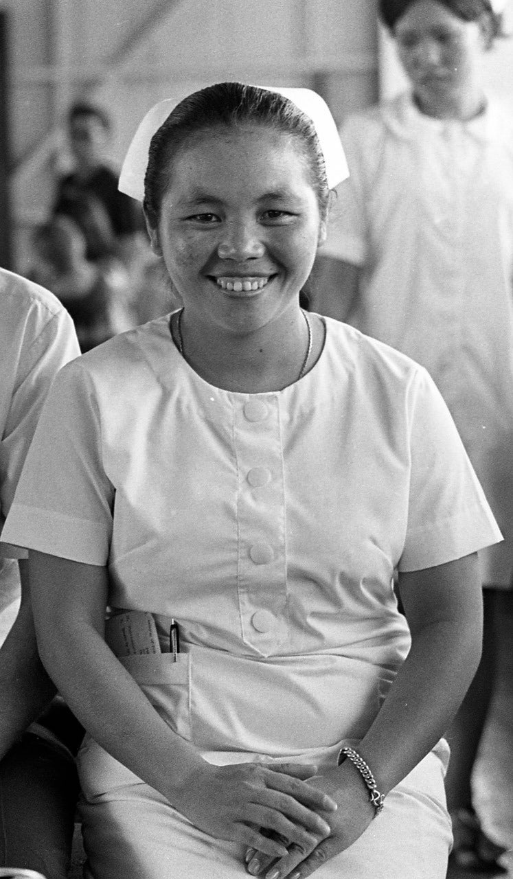 This photo provided by Hmong Story Legacy shows Choua Thao, the late mother of Chongly "Scott" Thao, during a graduation ceremony for a class of nurses at a Hmong nursing program in Ban Xon, Laos, 1971
