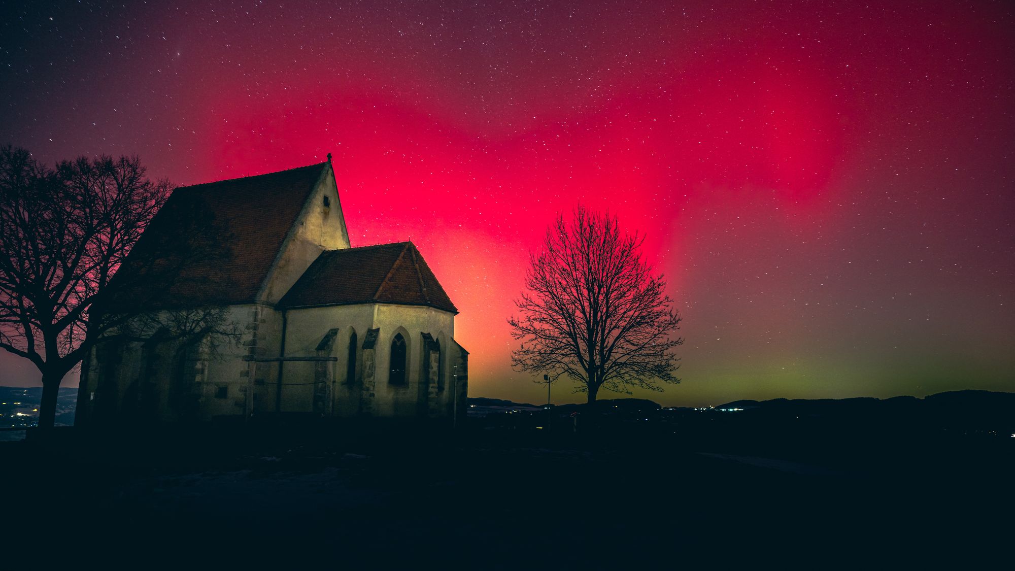 Aurora Borealis seen above der Wenzel church (Wenzelskirche) in Wartberg ob der Aist, Upper Austria