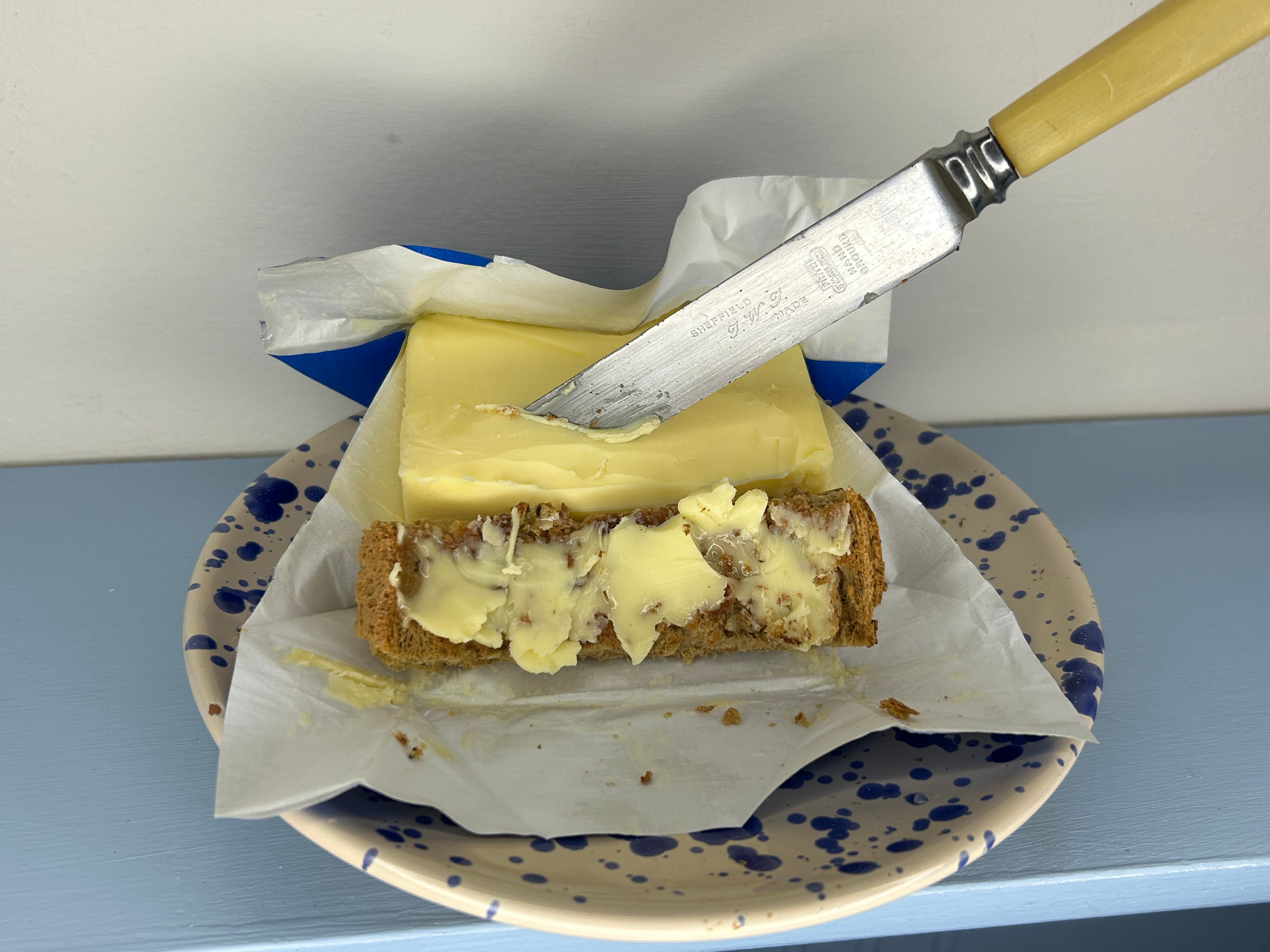 I got busy slathering the dairy spread on multiseed bread