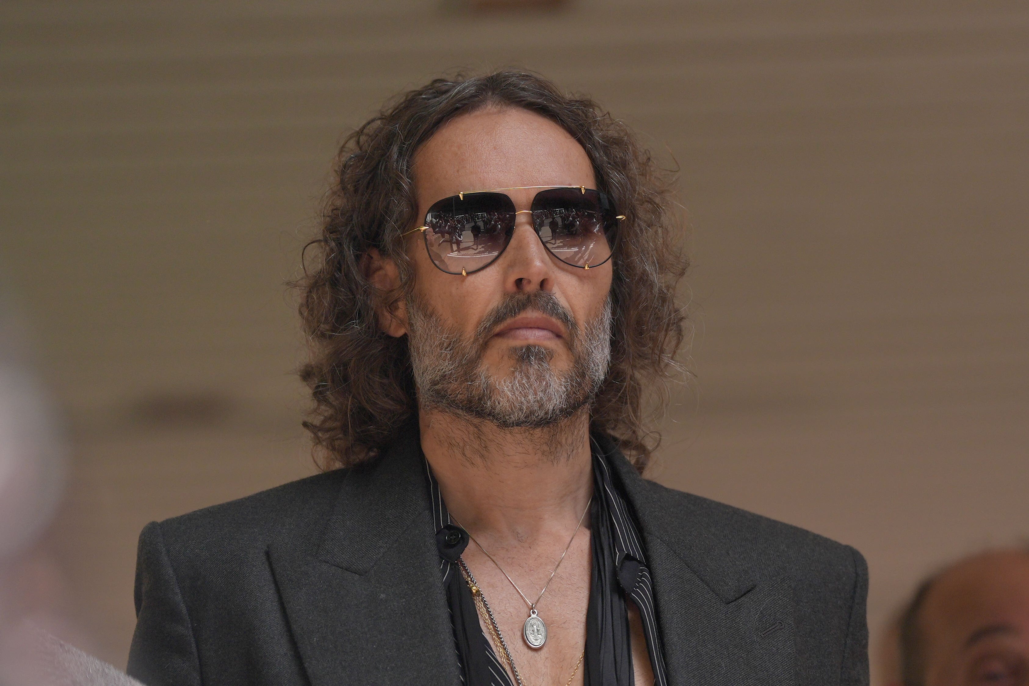 Brand outside court last May