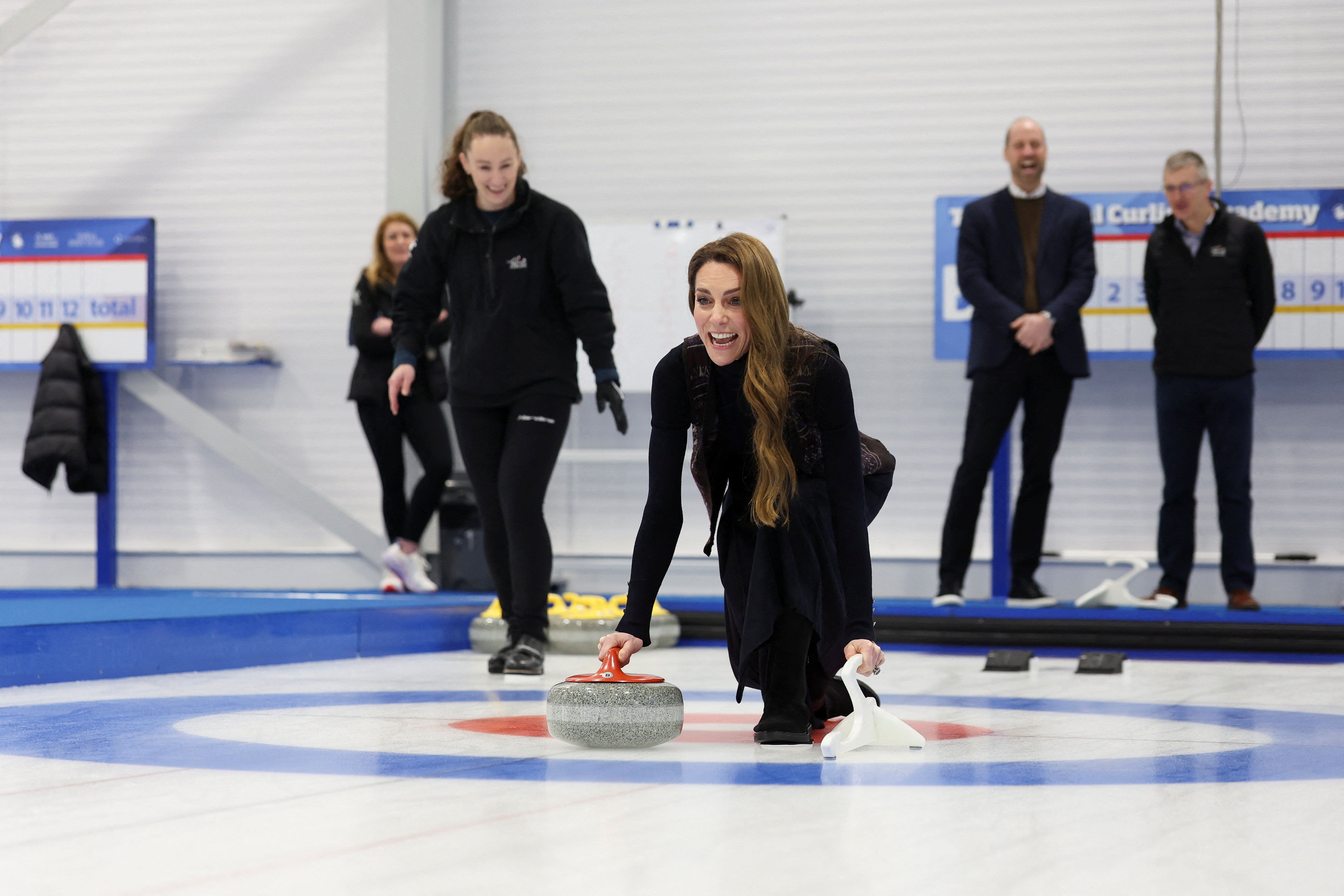 The Princess of Wales takes part in curling as she meets with Team GB and Paralympics GB members (Russell Cheyne/PA)