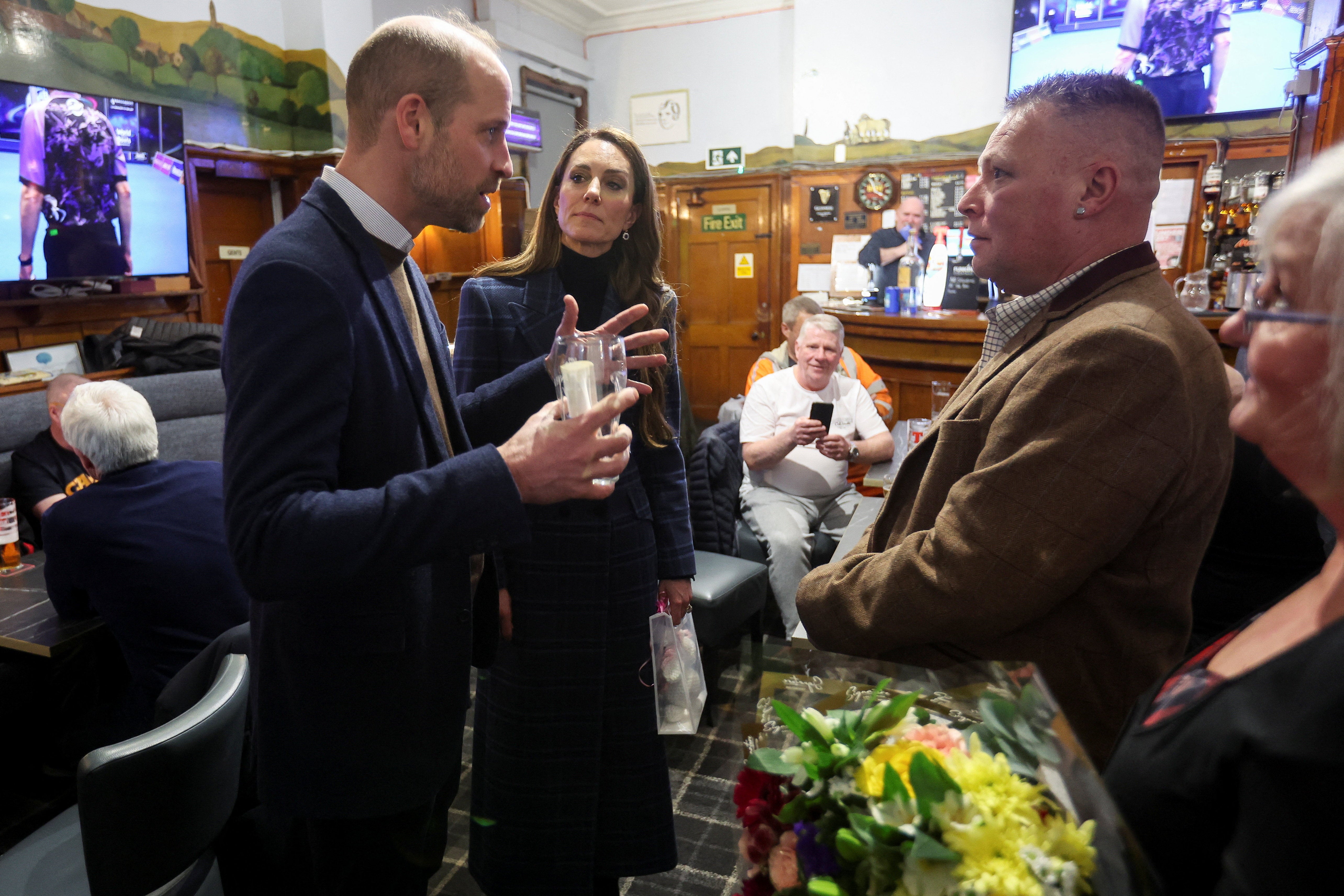 Prince William and Princess Kate meet people at 'The Gothenburg', known locally as 'The Goth', a community-run pub in the former mining village of Fallin, near Stirling