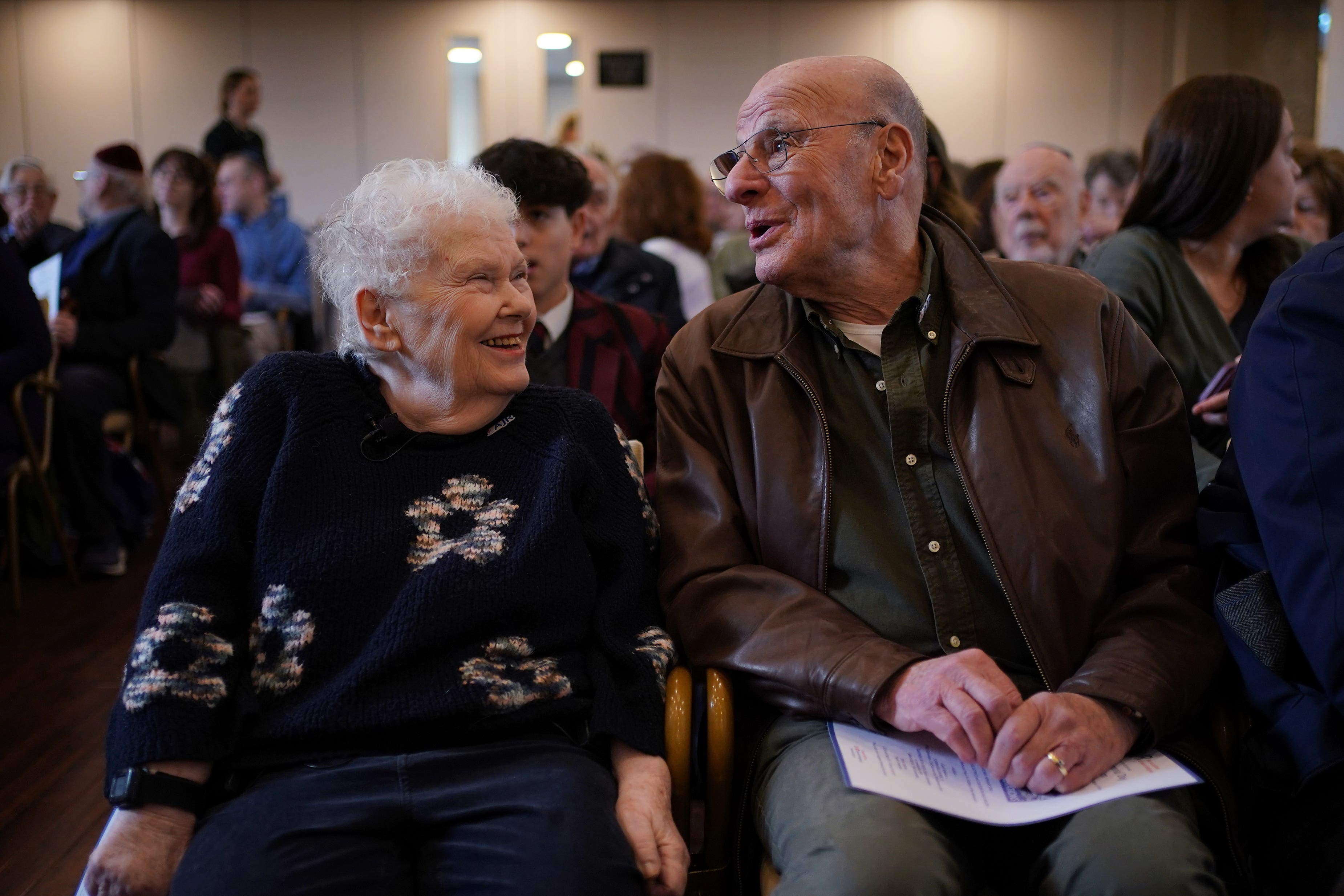 Joanna Millan (left) and Jackie Young, who were both Windermere Children, attending the Association of Jewish Refugees (AJR) Holocaust Memorial Day Service, at Belsize Square Synagogue in London (Yui Mok/PA)