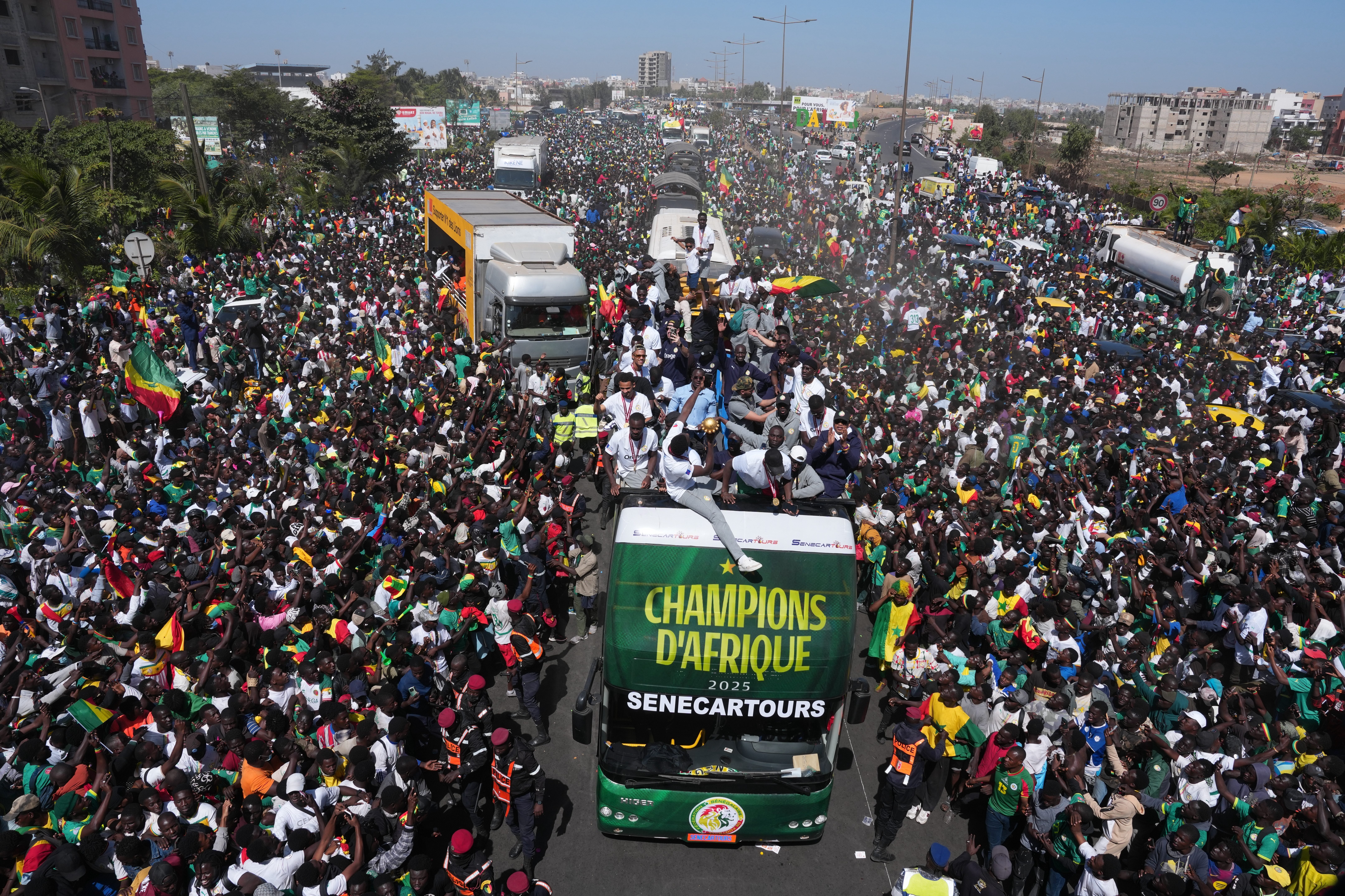 Senegal’s players were greeted by thousands of fans on Tuesday after winning Afcon
