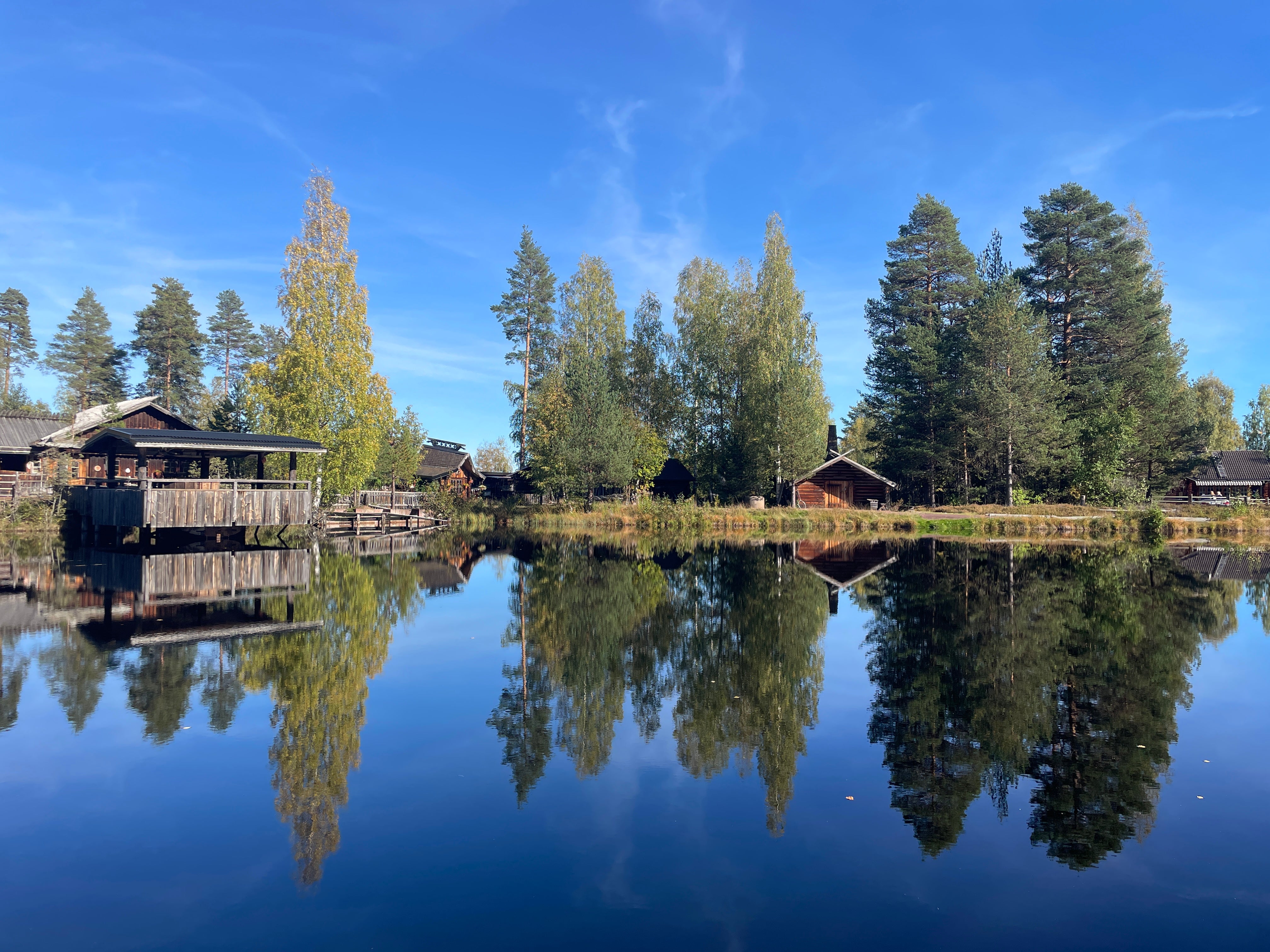 The route passes tranquil lakes and deep forests