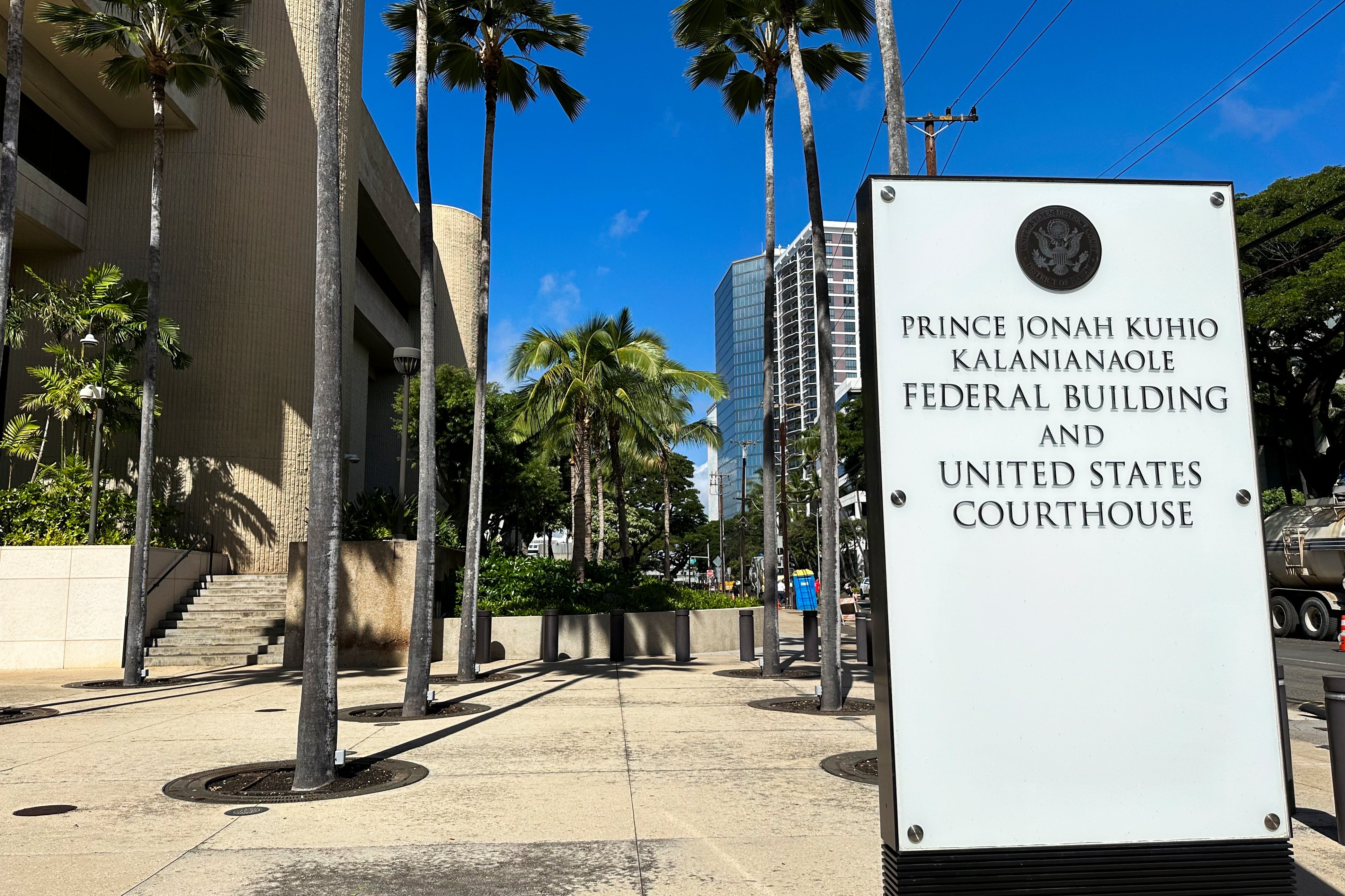 A sign for the Prince Jonah Kuhio Kalanianaole Federal Building and Courthouse is displayed outside the courthouse on Jan. 22, 2024, in Honolulu. (AP Photo/Jennifer Kelleher, File)