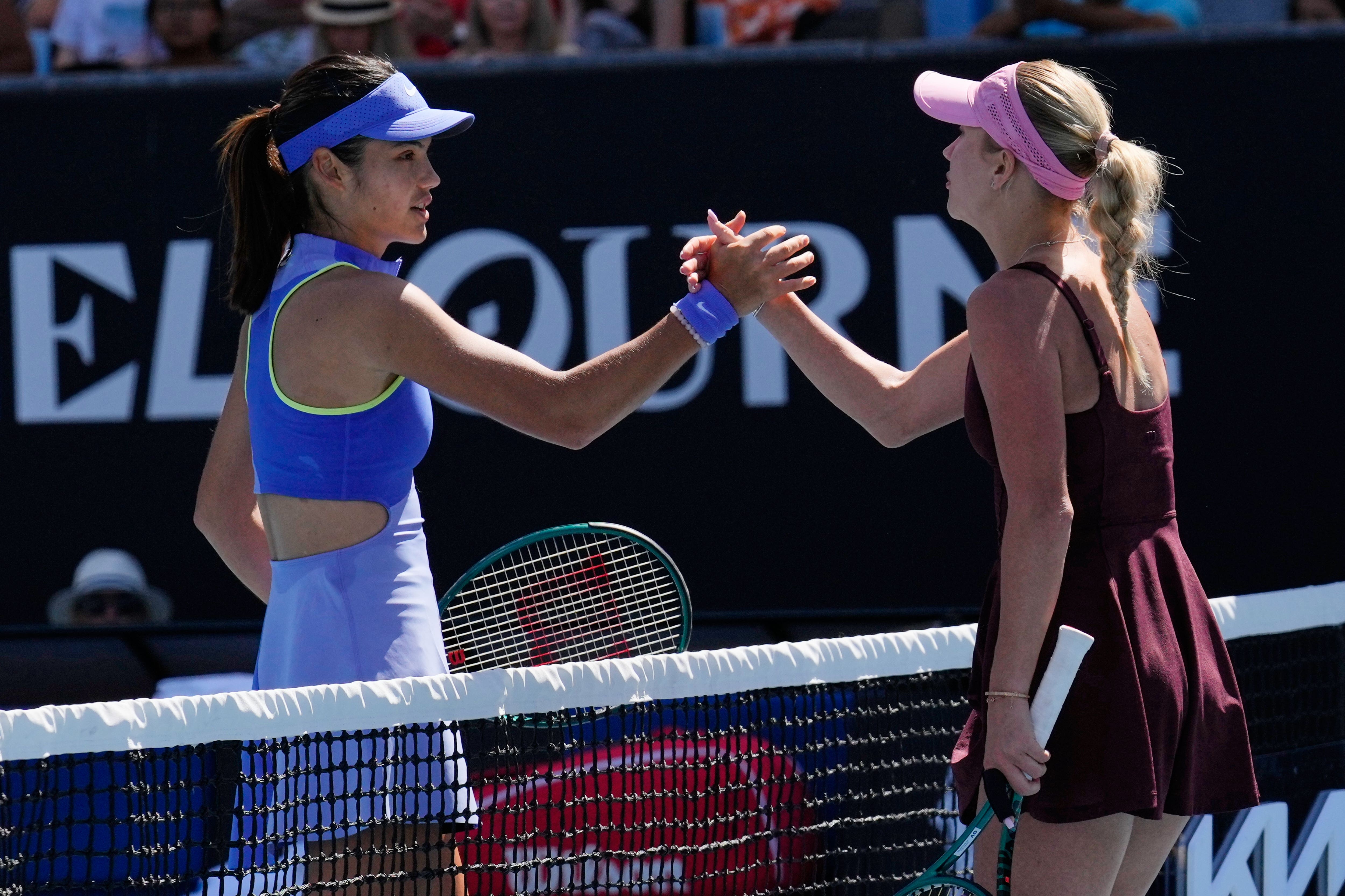 <p>Anastasia Potapova shakes hands with Emma Raducanu after beating the Brit at the Australian Open (Dar Yasin/AP)</p>