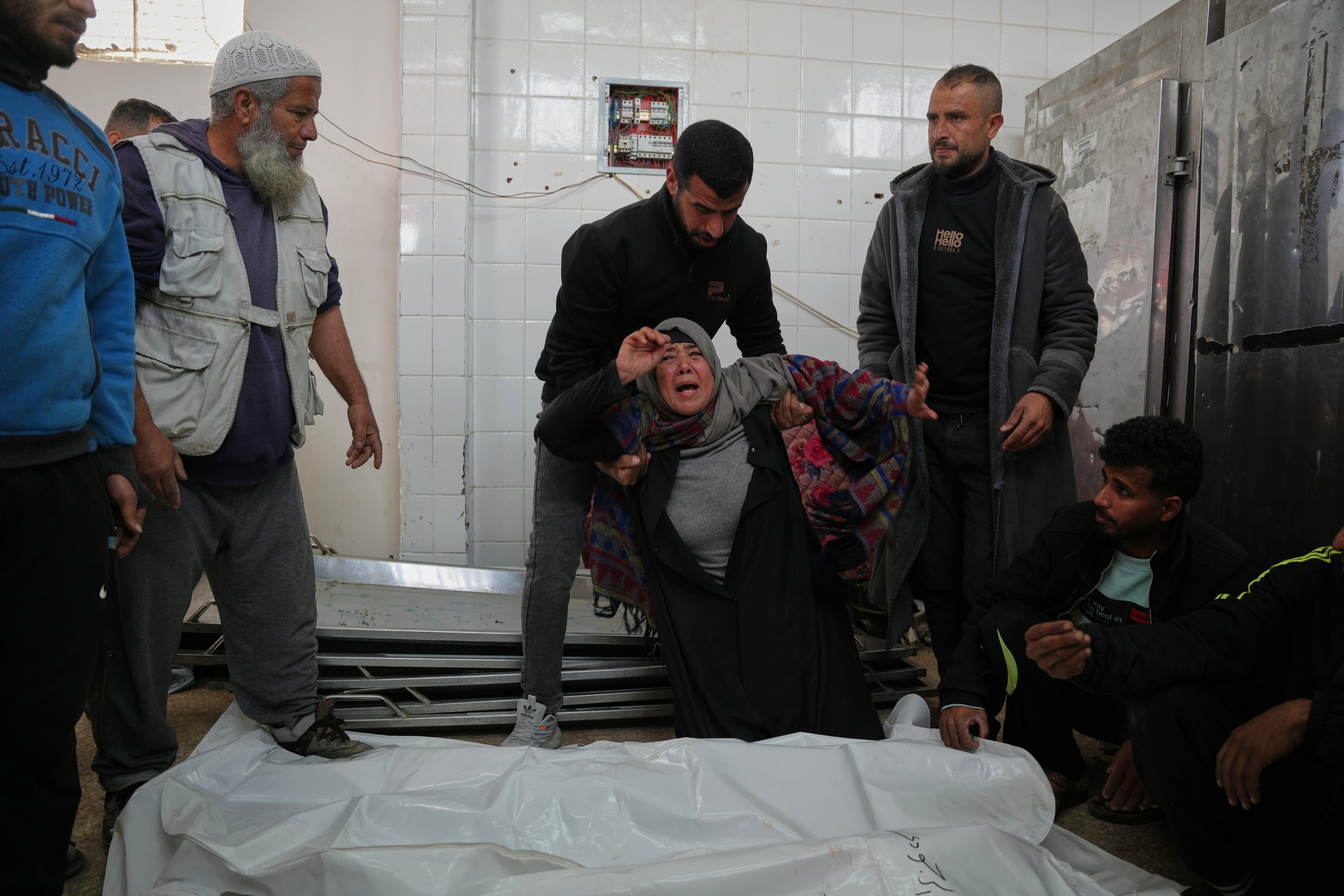A woman mourns the death of her nephew in Gaza, on 21 January