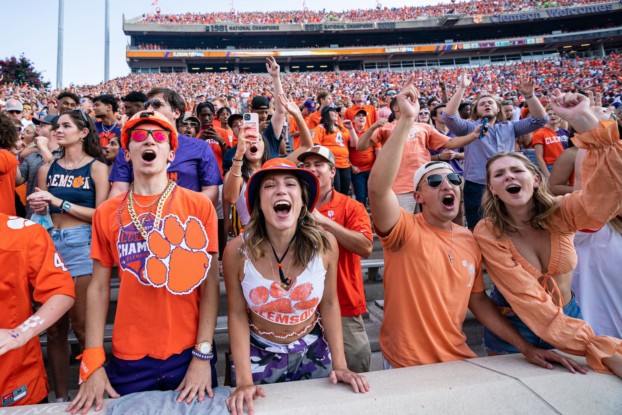 Clemson University students cheer at a football game in September 2021. An outbreak at the university and others at South Carolina schools have dramatically increased cases over the last month