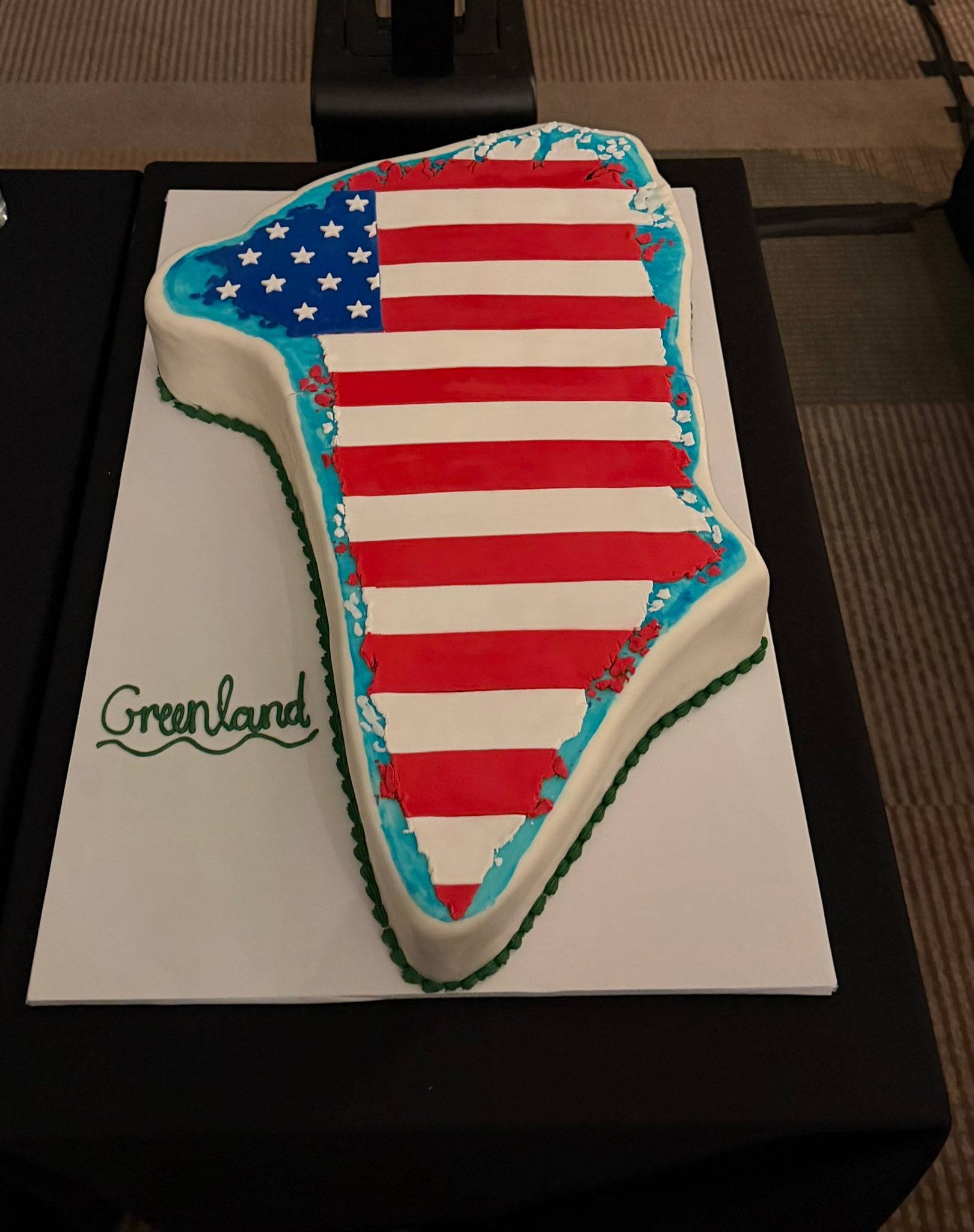 <p>A cake shaped like Greenland and covered in an American flag was served at an event attended by Republican lawmakers amidst Trump's attempts to acquire the Arctic island</p>