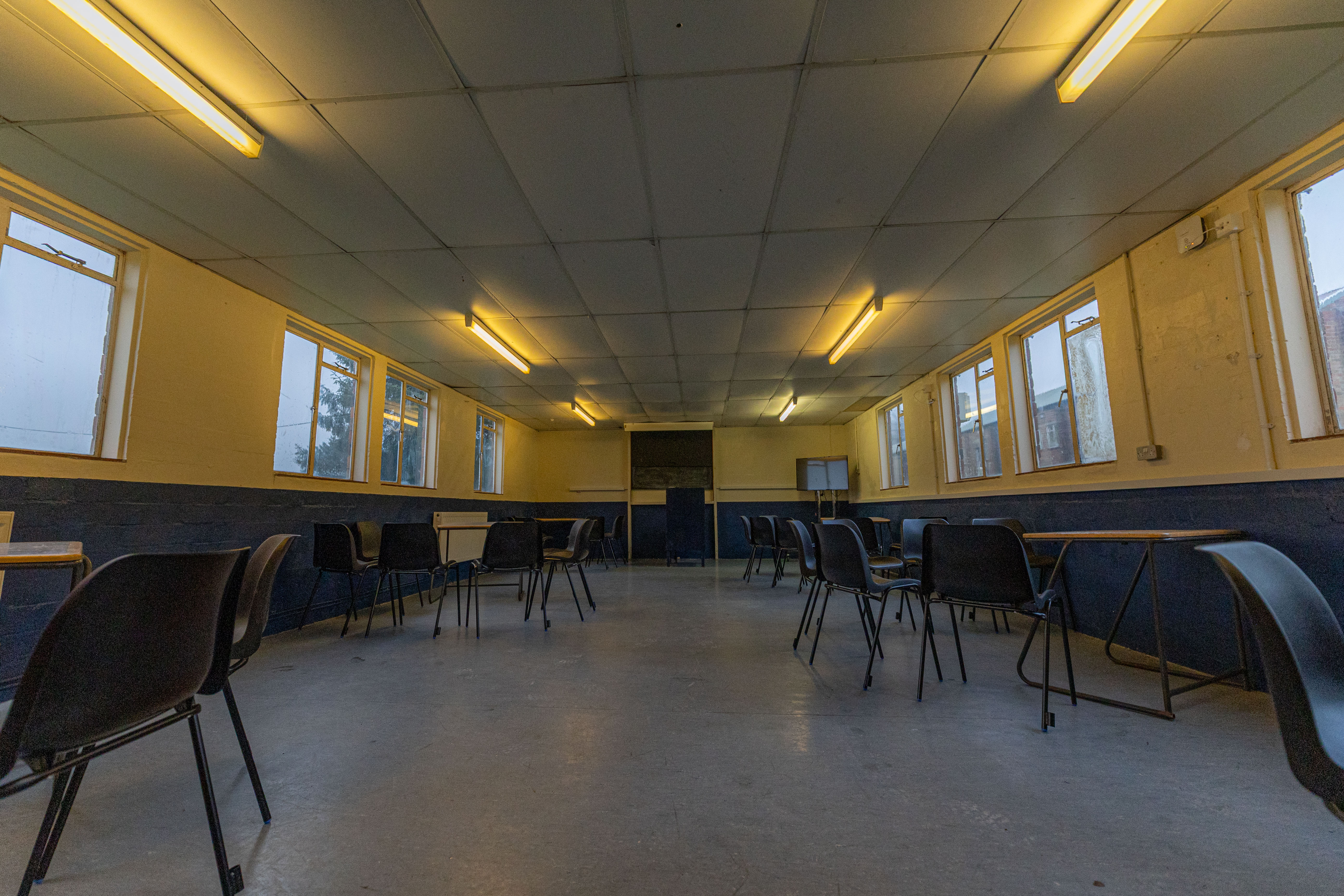 The Home Office has released photos of inside Crowborough army camp, including a hall with desks available for newly arrived asylum seekers