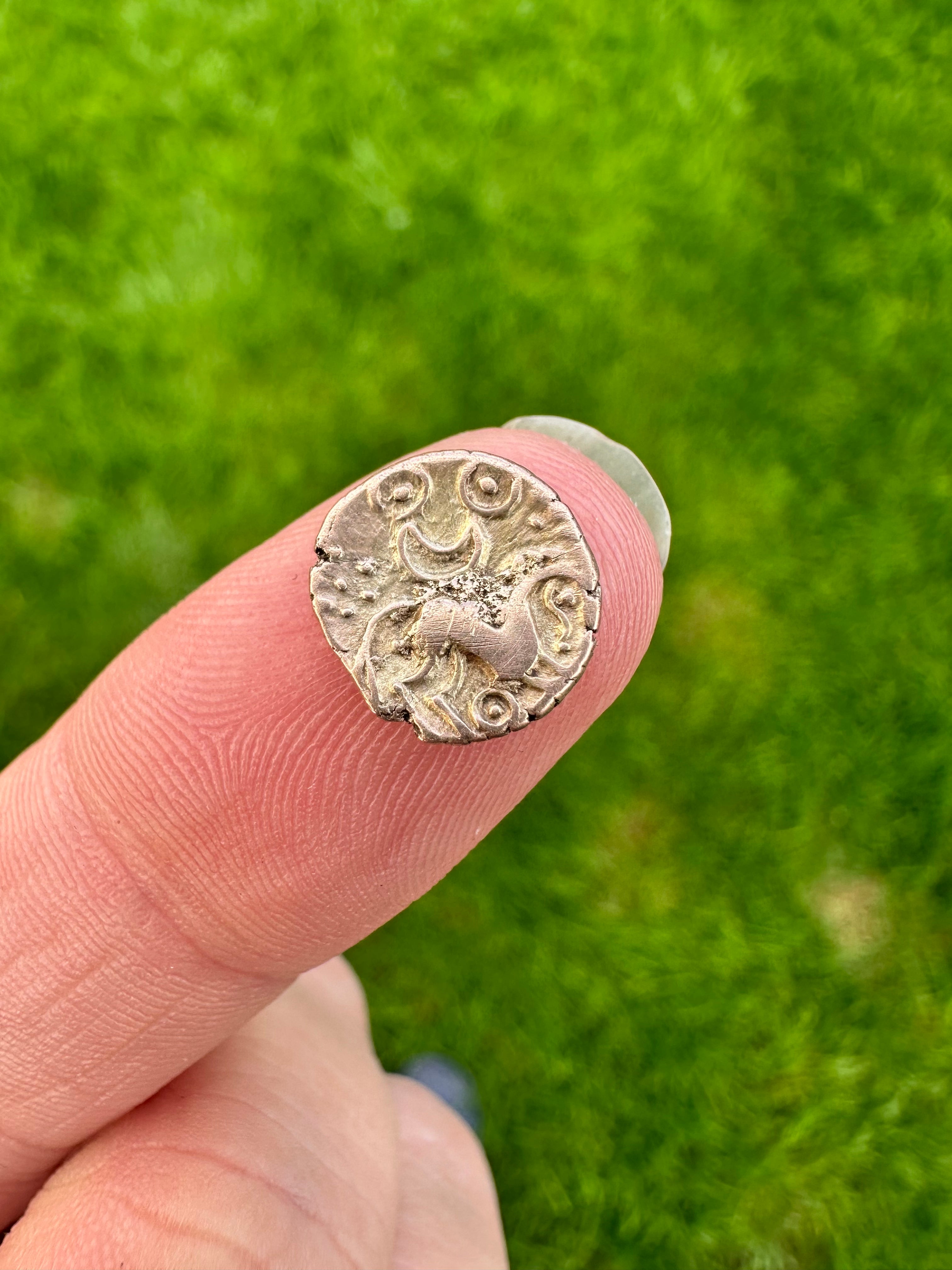 The Iron Age gold quarter stater Ms Youell uncovered in a Norfolk field