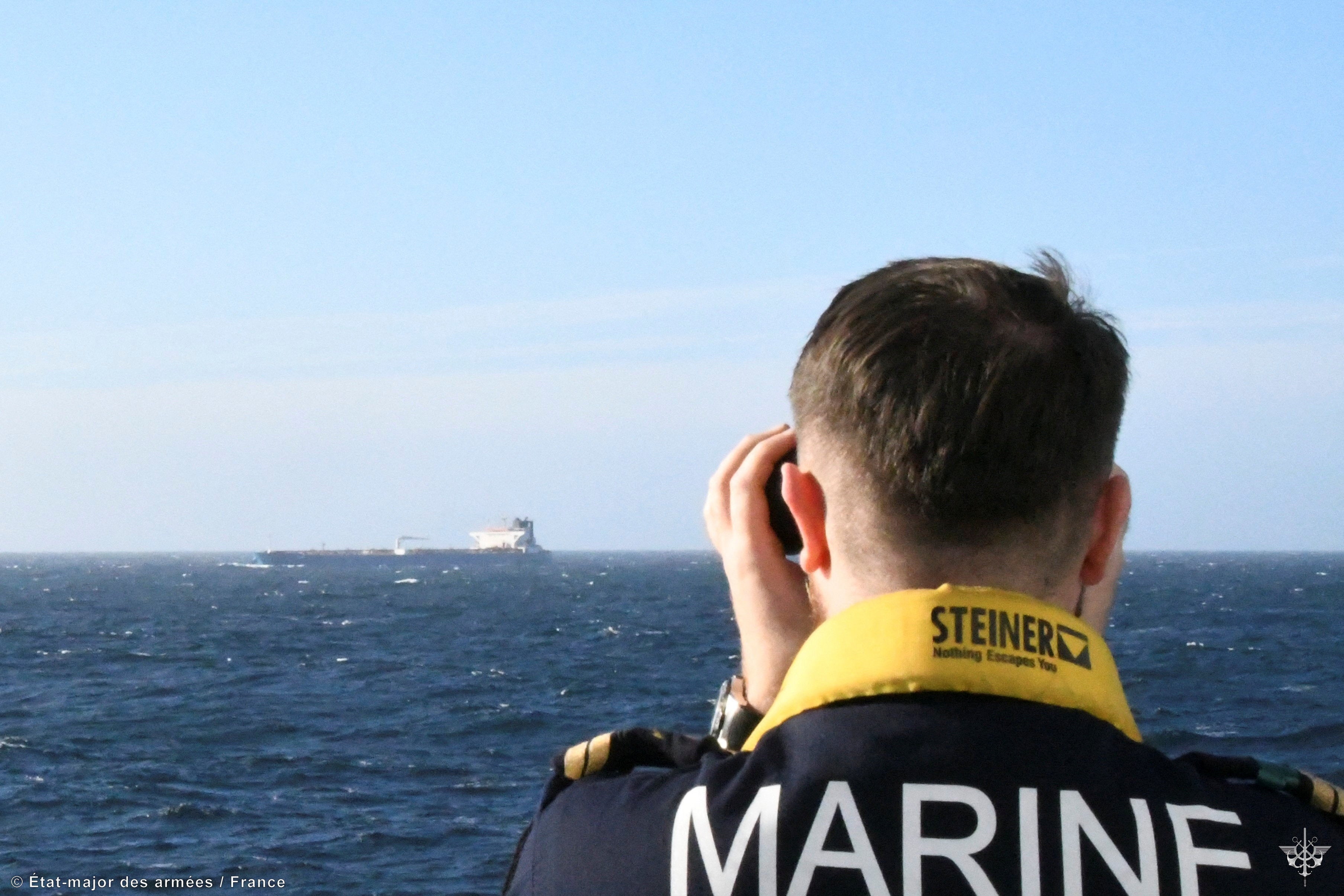 Marine officer monitors the cargo tanker Grinch, which had departed from Murmansk, Russia