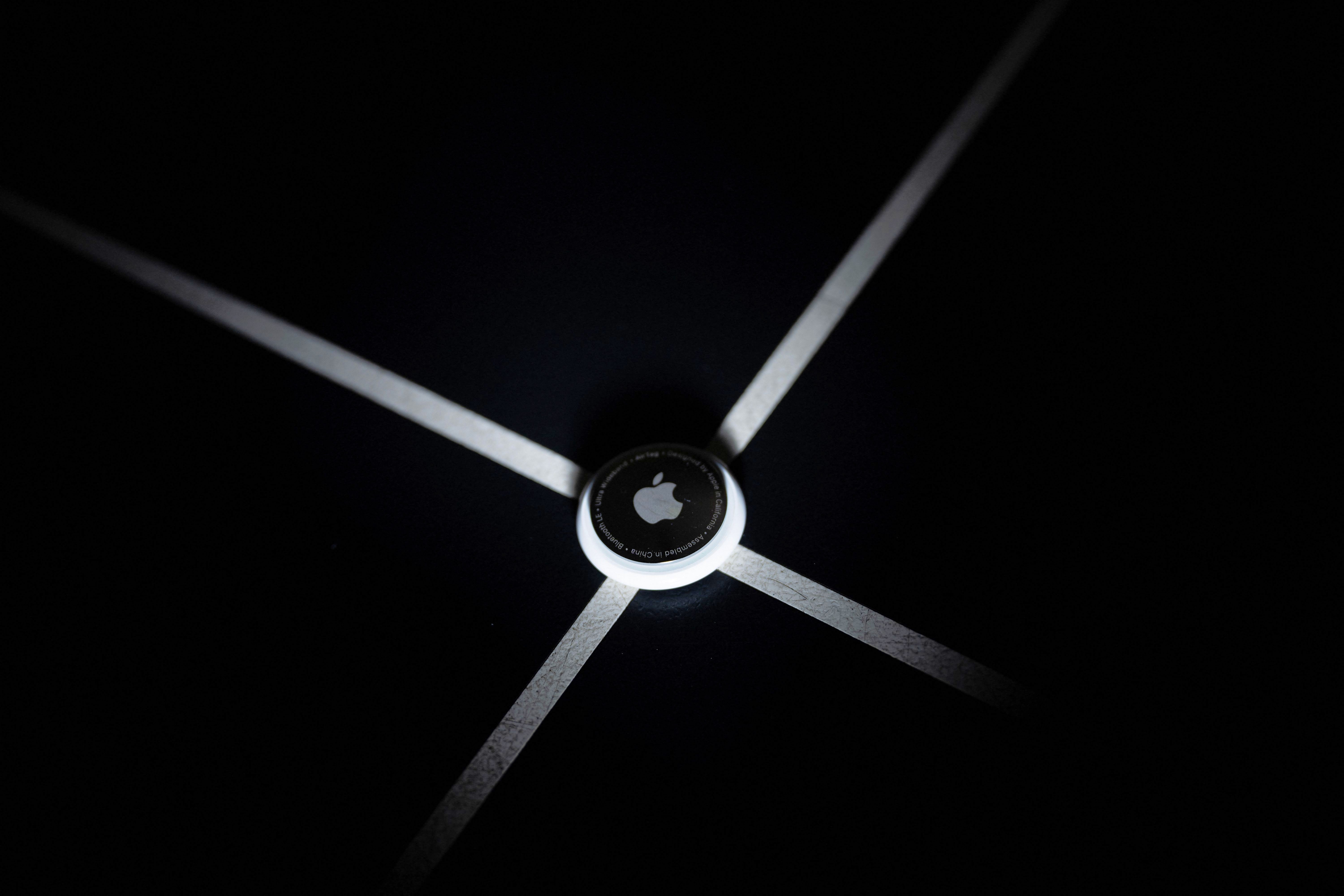 An Apple AirTag pictured in Washington, DC on 13 February, 2023. A new AI device rumoured to be coming in 2026 will be roughly the same size as an AirTag