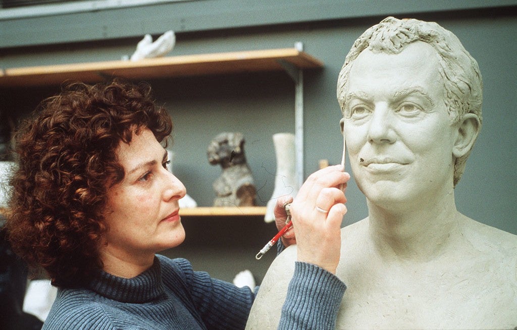 Sculptor Karen Newman modelling a clay head of Tony Blair at the Madame Tussauds waxworks museum in 1995
