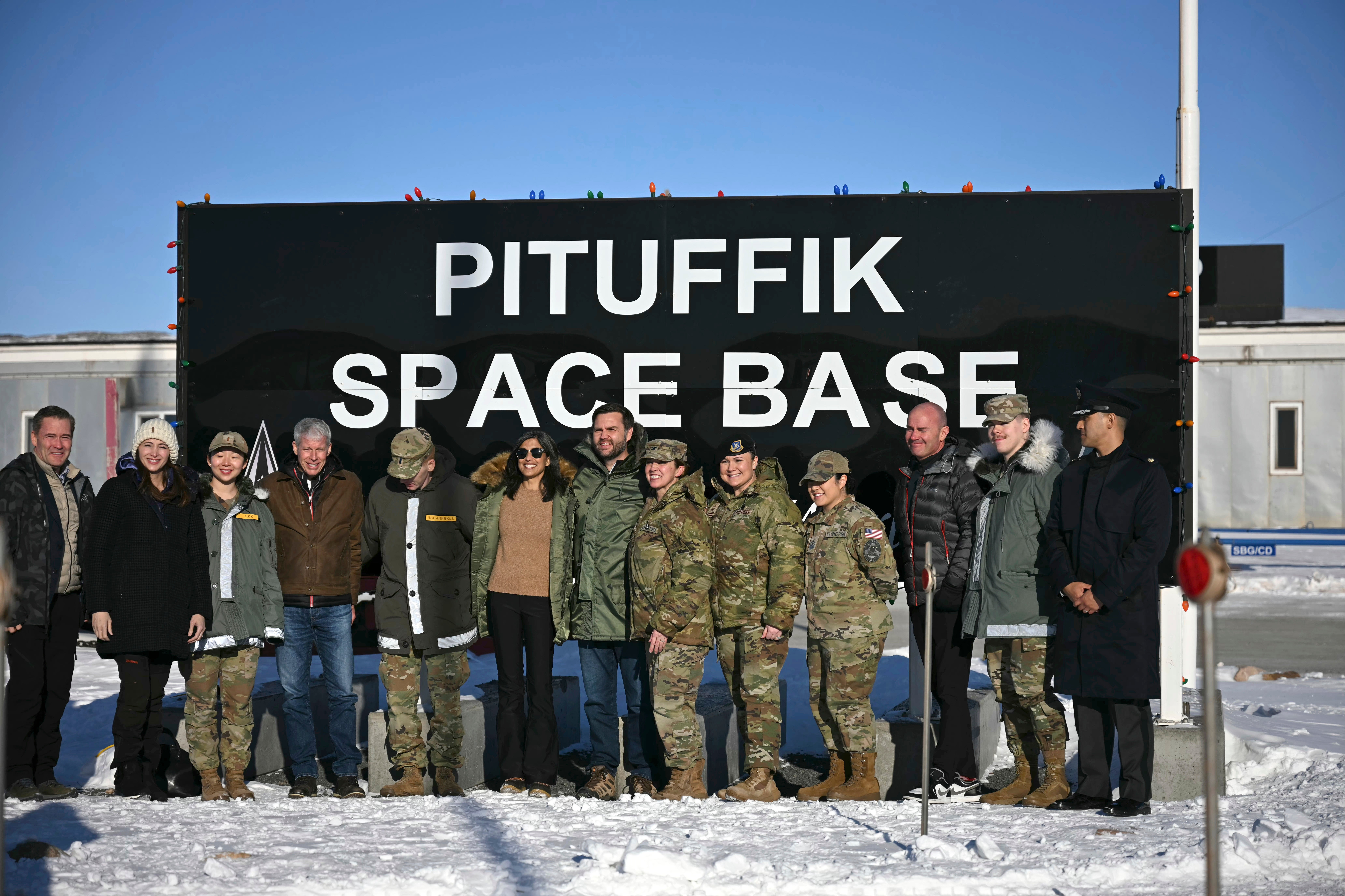 Vice President JD Vance, center right, and second lady Usha Vance, center left, pose with personnel at Pituffik Space Base in Greenland on March 28, 2025. (Jim Watson/Pool Photo via AP, File)