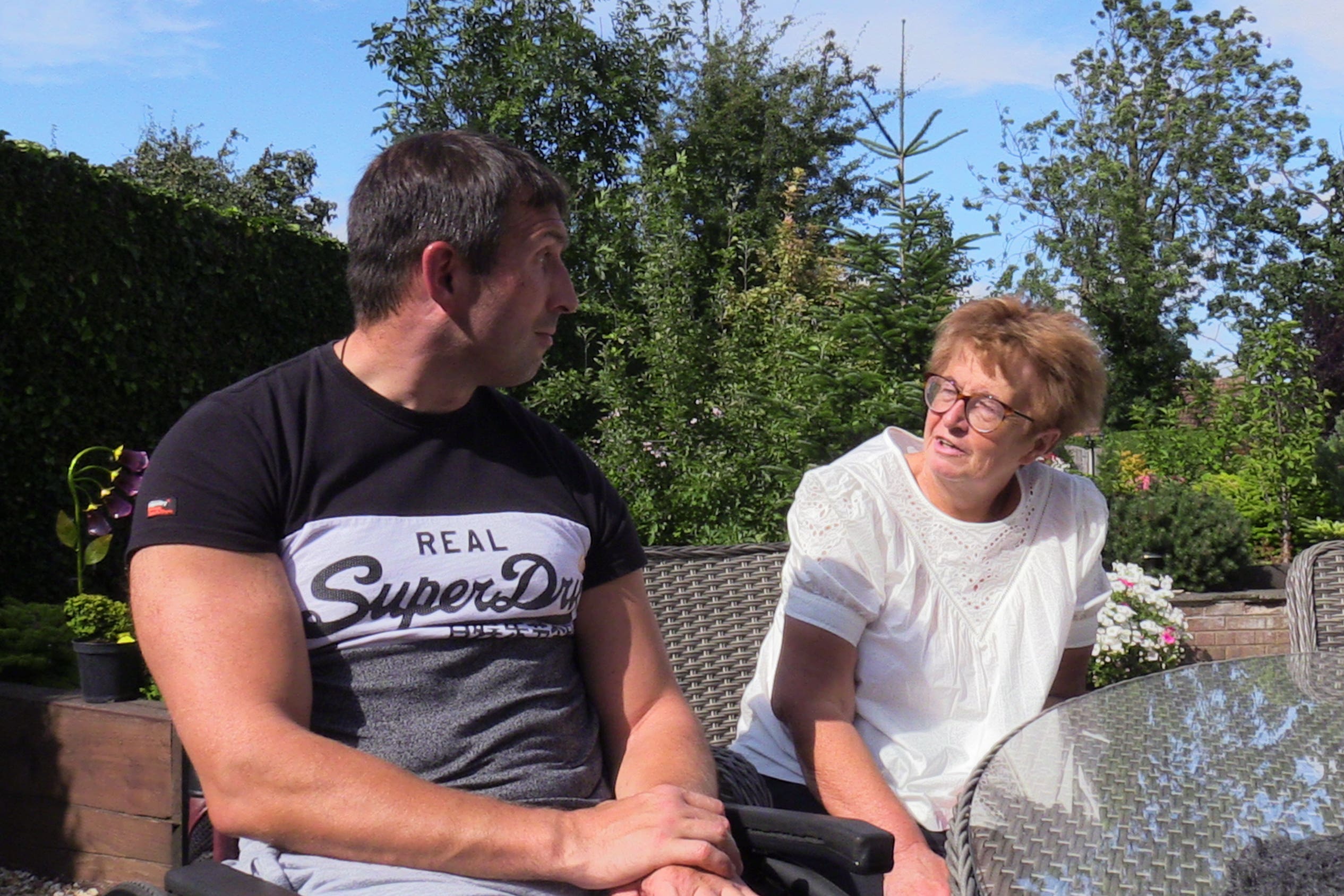 Seriously injured veteran Ben Parkinson with his mother Diane Dernie at their home in Doncaster, Yorkshire (Dave Higgens/PA)