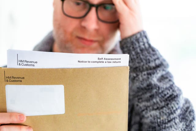 <p>Under the current rules, those who miss the self-assessment submission deadline get an automatic £100 fine</p>