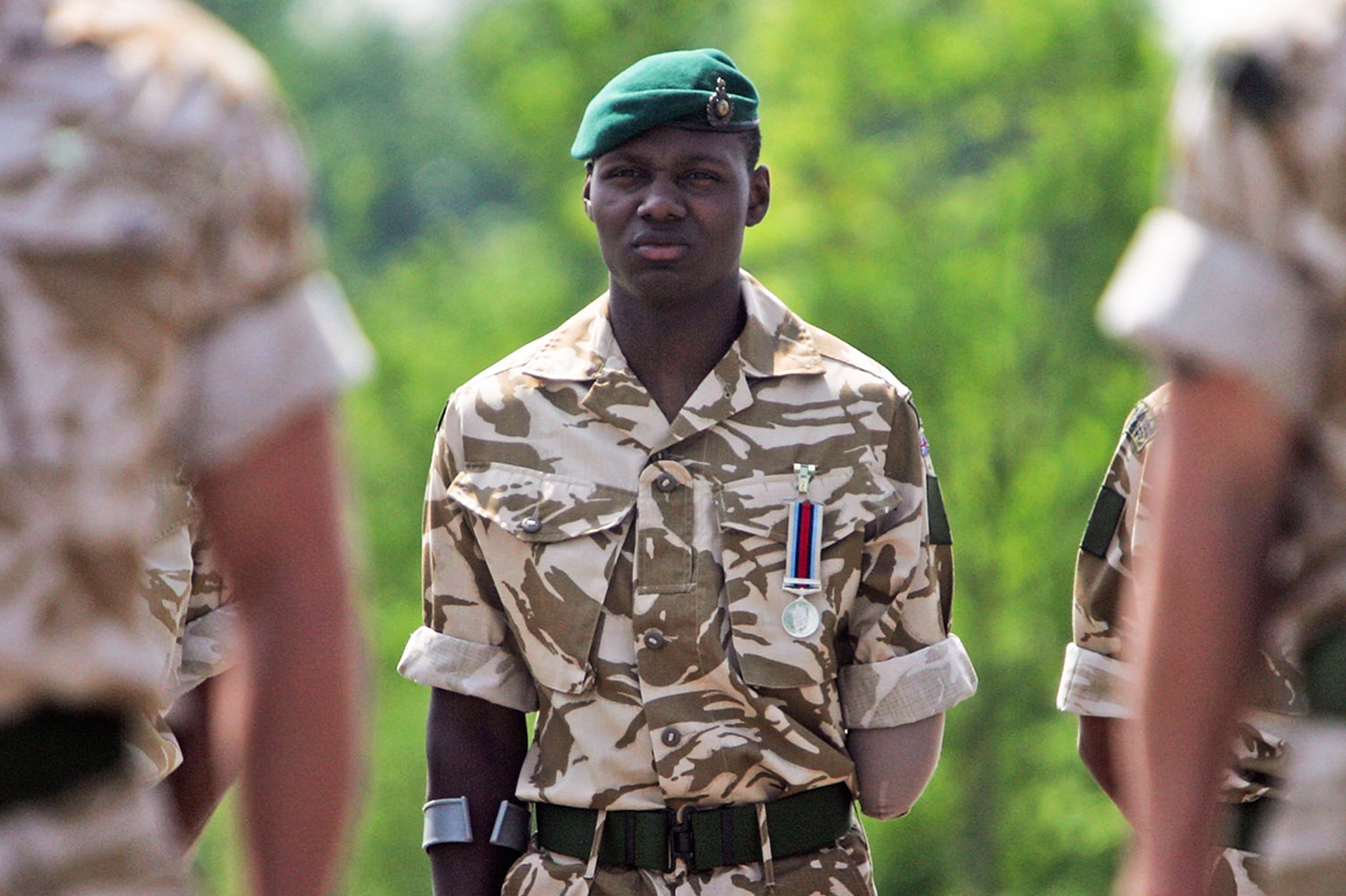 Ben McBean stands during the parade at the 40 Commando Royal Marines in 2008