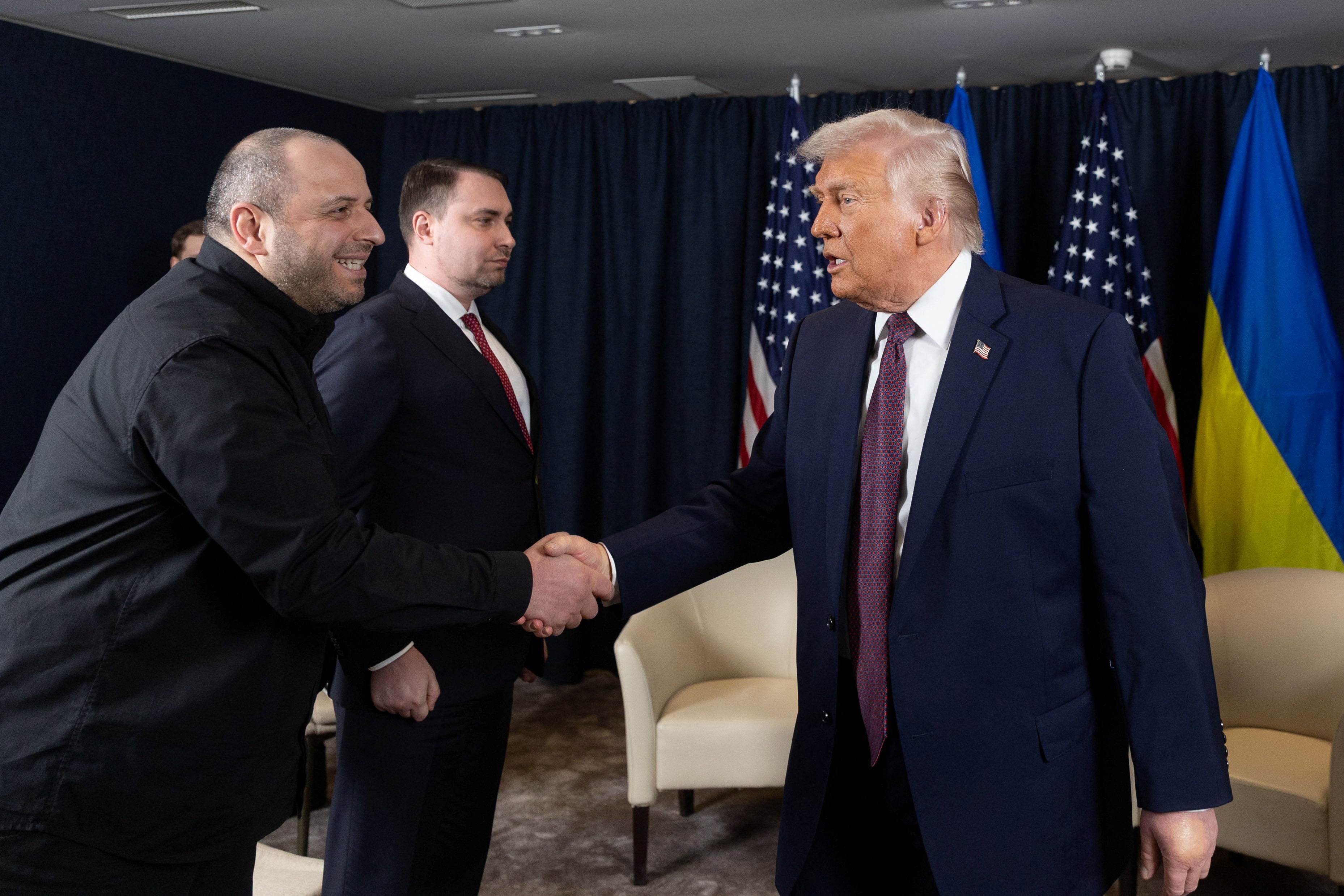U.S. President Donald Trump shakes hands with Secretary of Ukraine's National Security and Defence Council Rustem Umerov