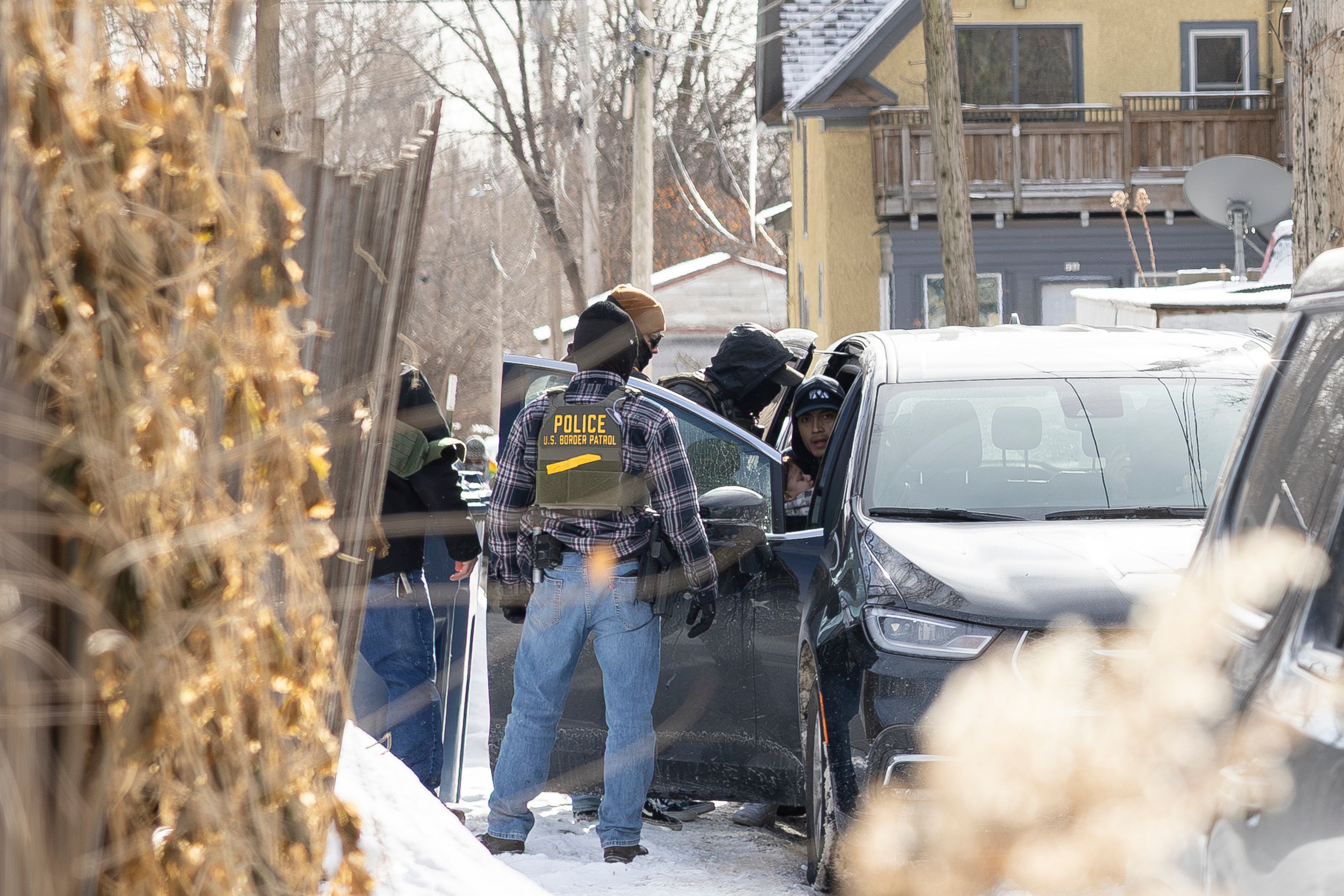 Border patrol officers were pictured arresting Elvis Joel Tipan Echeverria and his two-year-old daughter Chloe in Minneapolis January 22