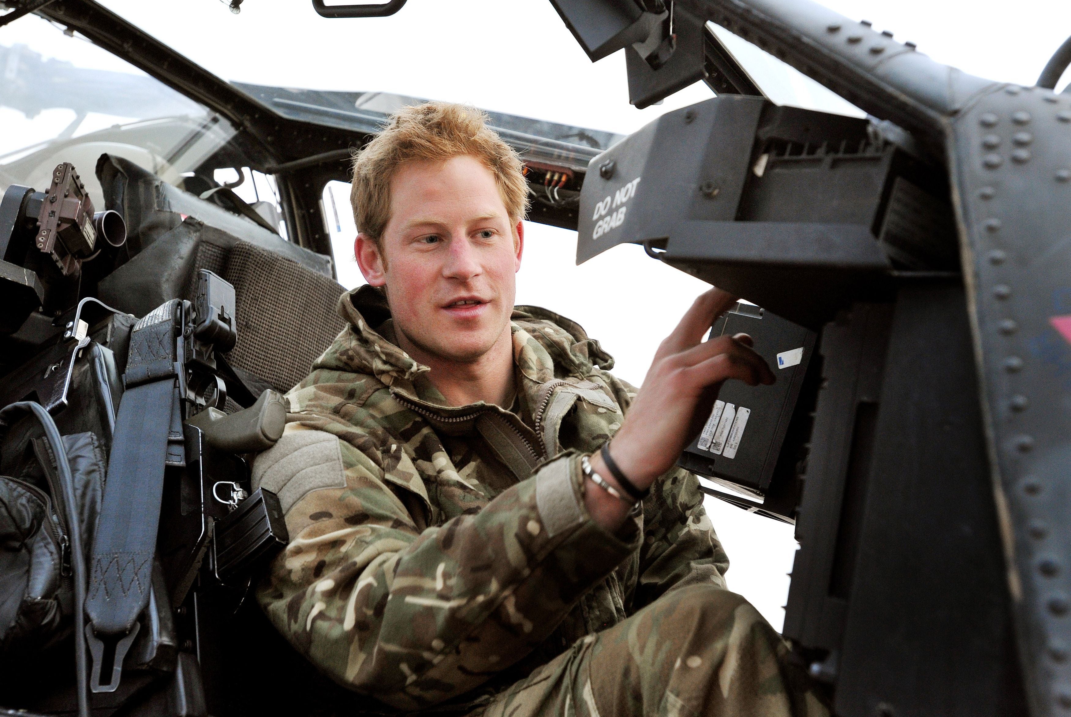 Harry making pre-flight checks in his cockpit at Camp Bastion, southern Afghanistan, in 2012